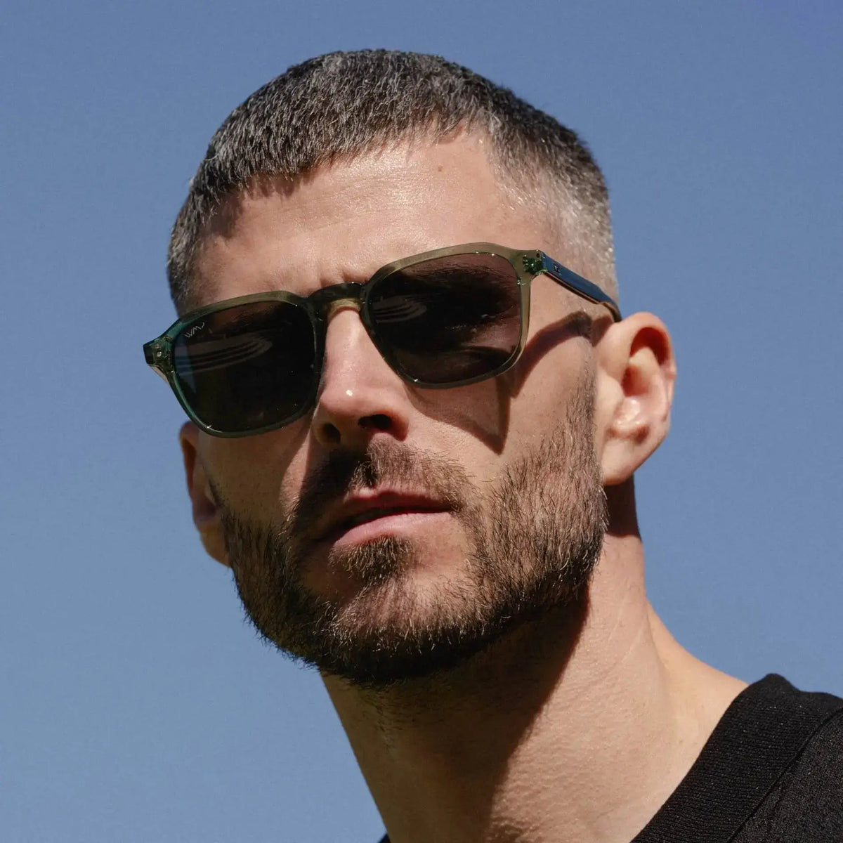 Emerald Green / Grey || Model wearing Men's Square Prescription Sunglasses with Emerald Green Frame and Grey Lens