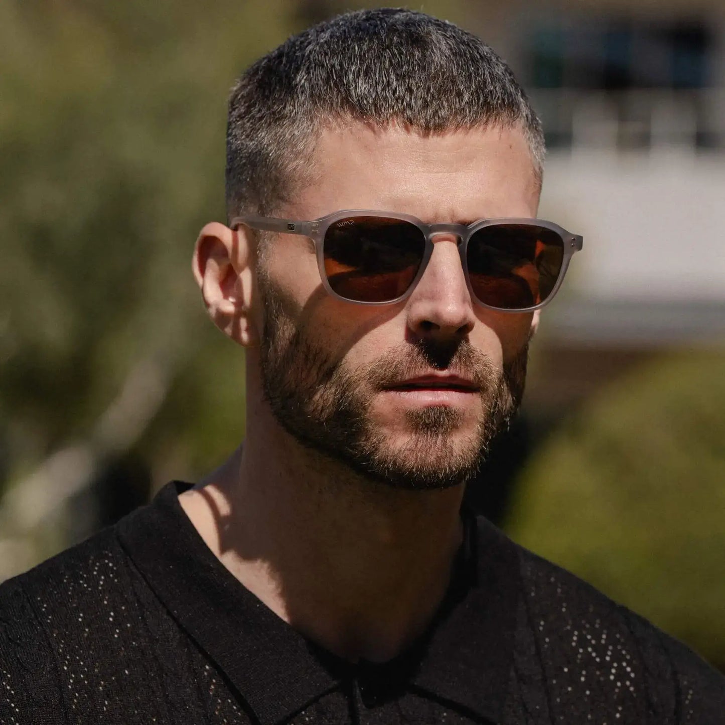 Moonrock Grey / Amber || Model wearing Men's Square Prescription Sunglasses with Moonrock Grey Frame and Brown Lens