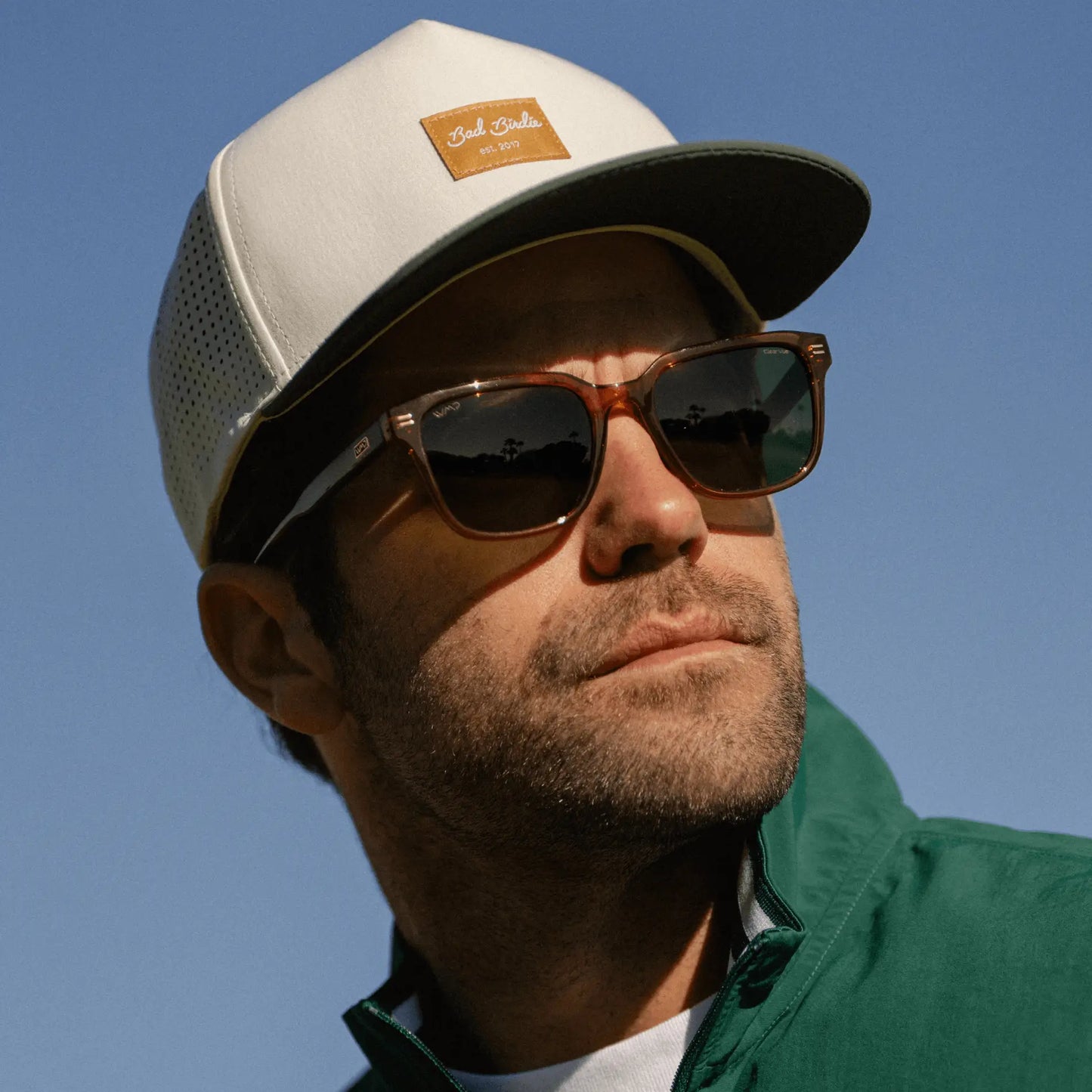 Canyon Brown / G15 || Model wearing Men's Geometric Rectangular Prescription Sunglasses with Brown Acetate Frame and Green Lens