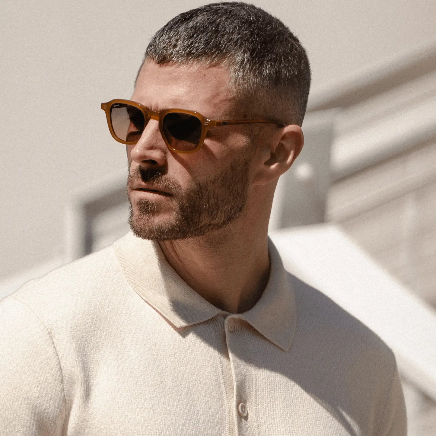 Dune Brown / Amber || Model wearing Men's Geometric Square Prescription Sunglasses with Dune Brown Acetate Frame and Amber Lens