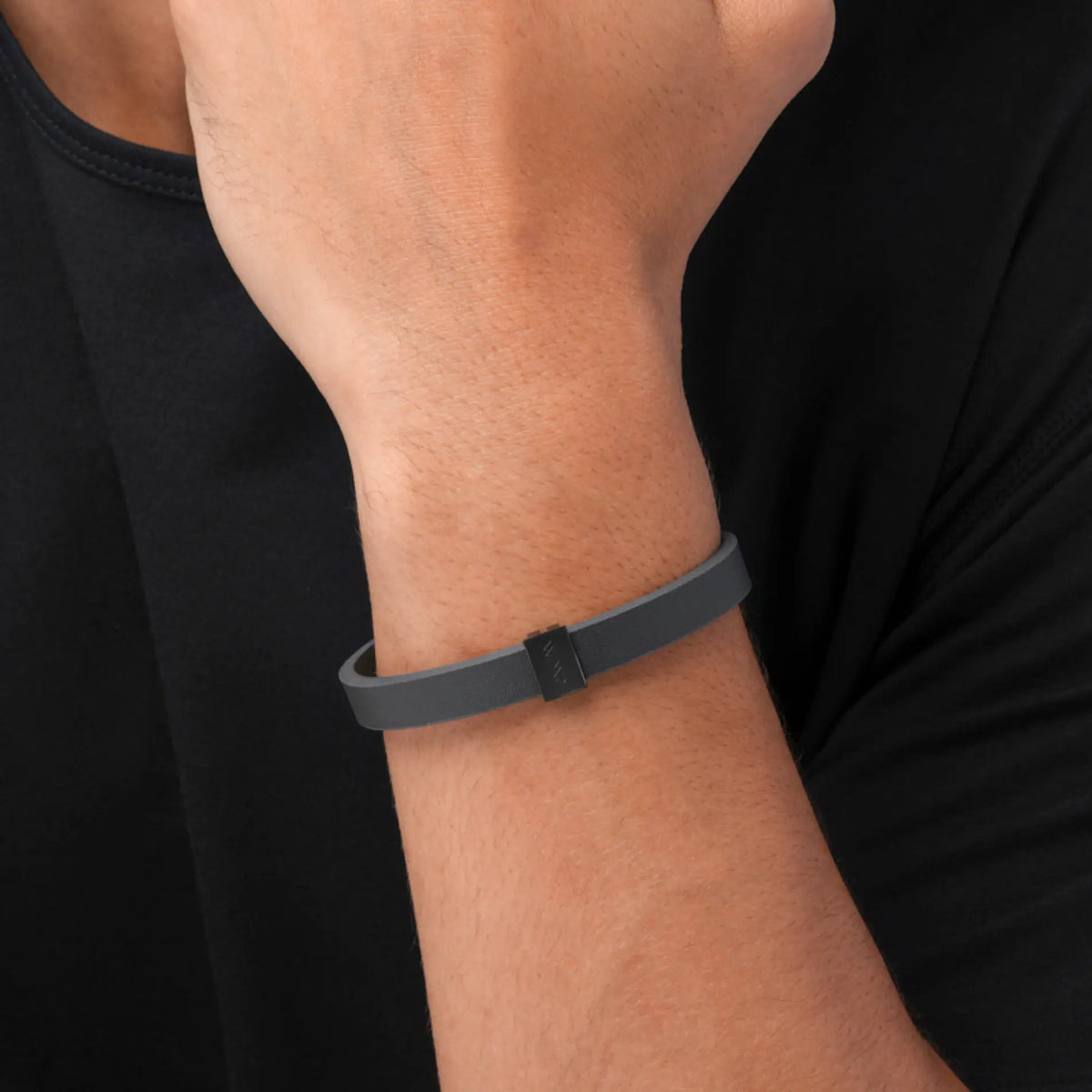 Black Metal / Grey Leather || Model wearing Grey Leather Cuff Bracelet with Black Metal Accents.