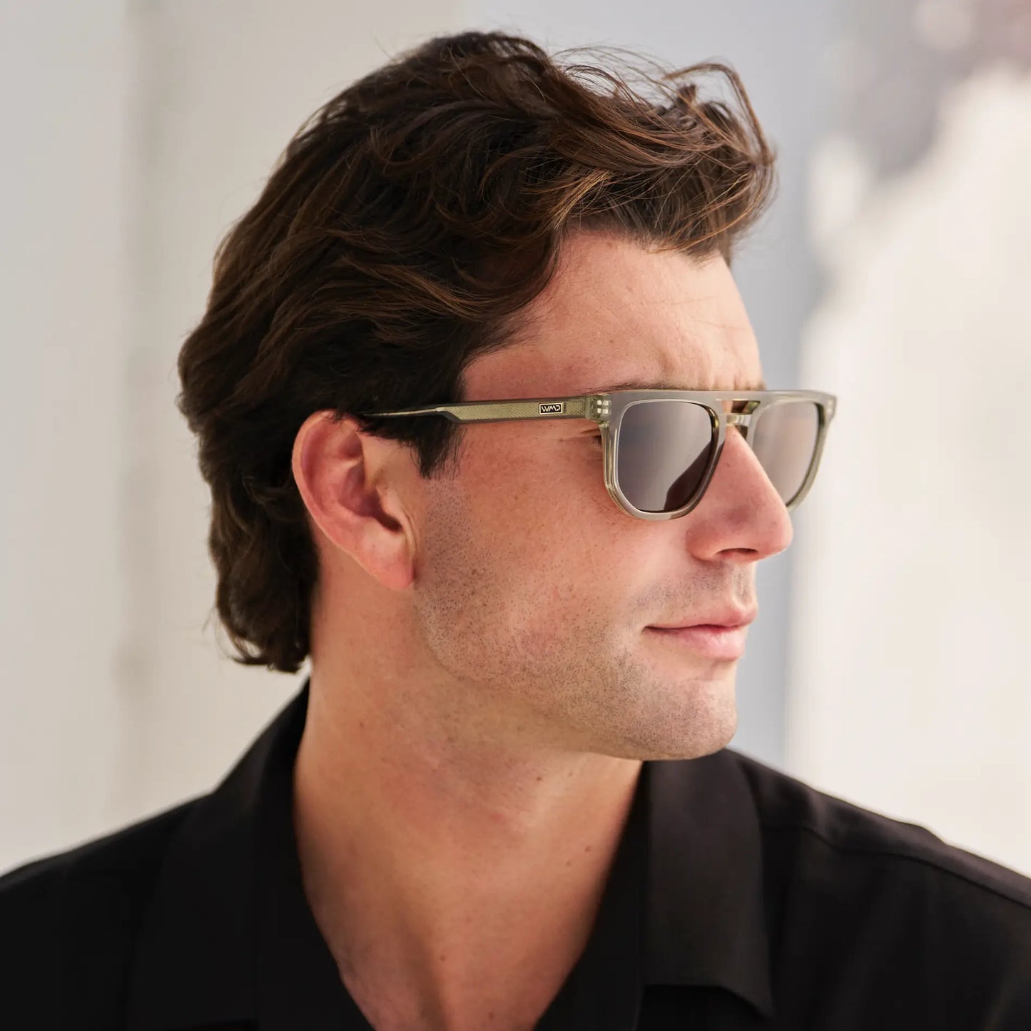 Palm Green / Dark Brown Lens || Model wearing Men's Rectangular Double Bridge Aviator Polarized Sunglasses with Green Frame and Brown Lenses on a white background