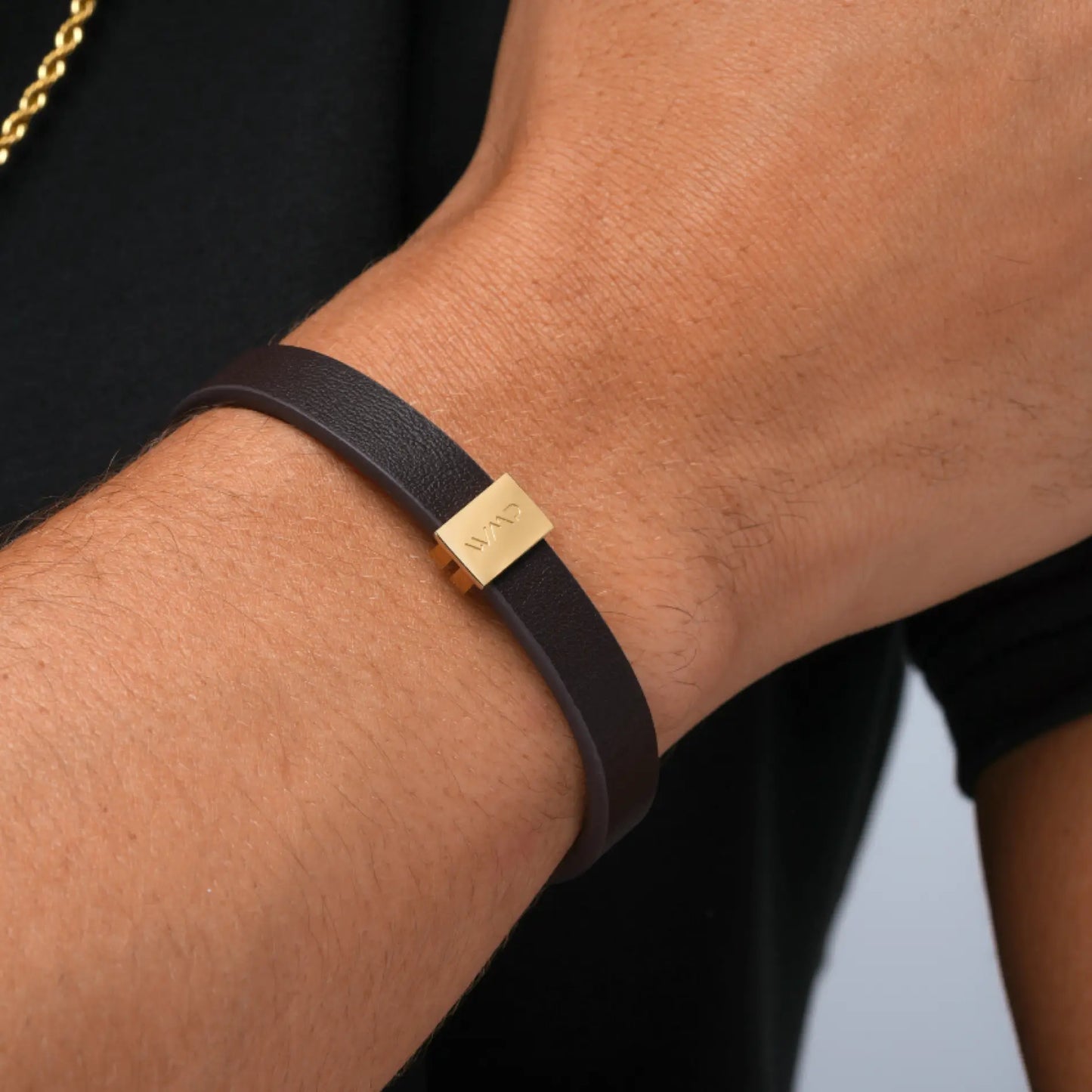 Gold / Dark Brown Leather || Model wearing Brown Leather Cuff Bracelet with Gold Metal Accents.