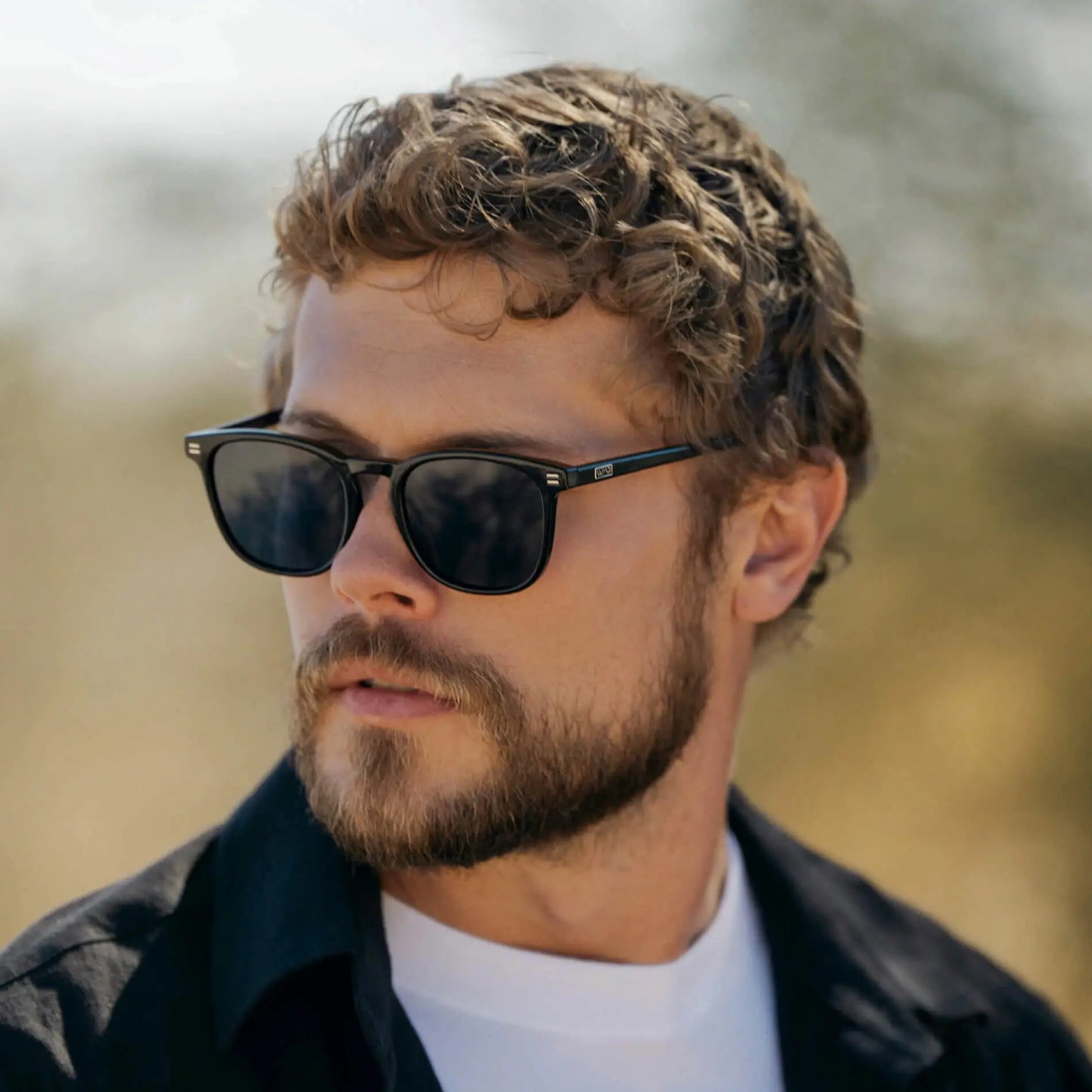 The Obsidian Kit || Men's Gift Kit including Two Pairs of Black Acetate Frame Polarized Black Lens Sunglasses, a stainless steel cuff bracelet, and a stainless steel and polyester rope braided bracelet in gold and black