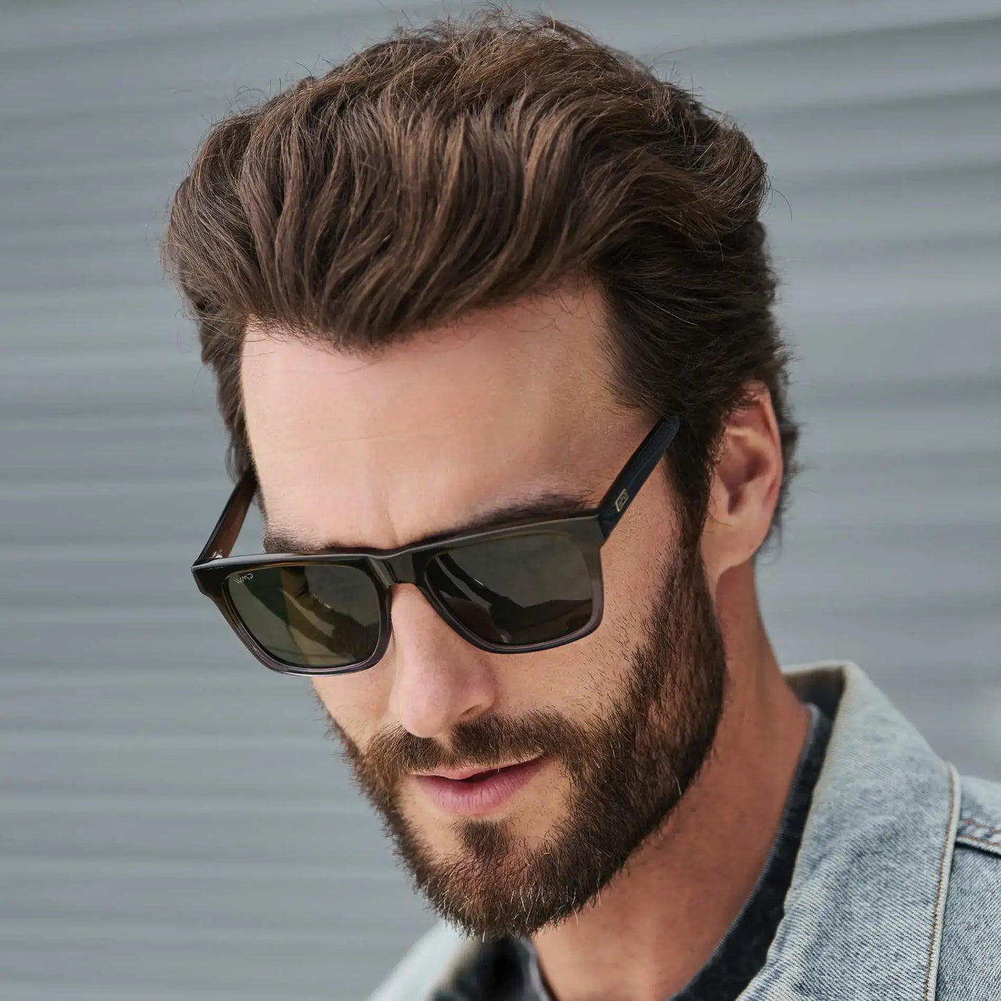 Blue Forest Fade / G15 || Square prescription sunglasses with blue forest fad acetate frame and slightly rounded edges worn by man outdoors