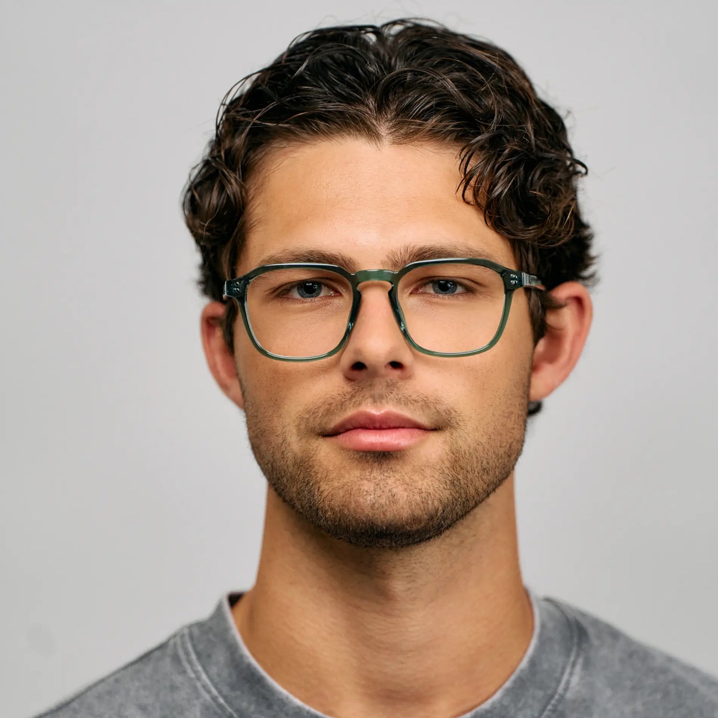 Emerald Green || Square prescription glasses with emerald green acetate frame and keyhole bridge worn by man indoors
