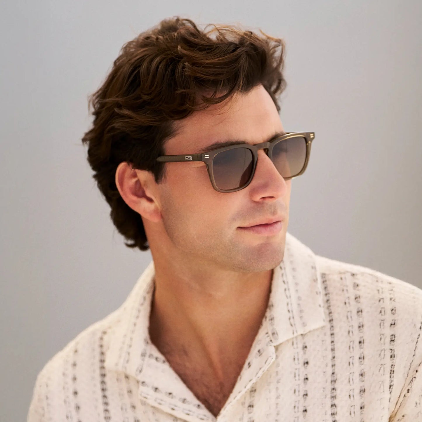 Khaki Green / Grey Brown Gradient Lens || Model wearing Men's Rectangular Polarized Sunglasses with Green Frame and Grey Brown Gradient Lenses