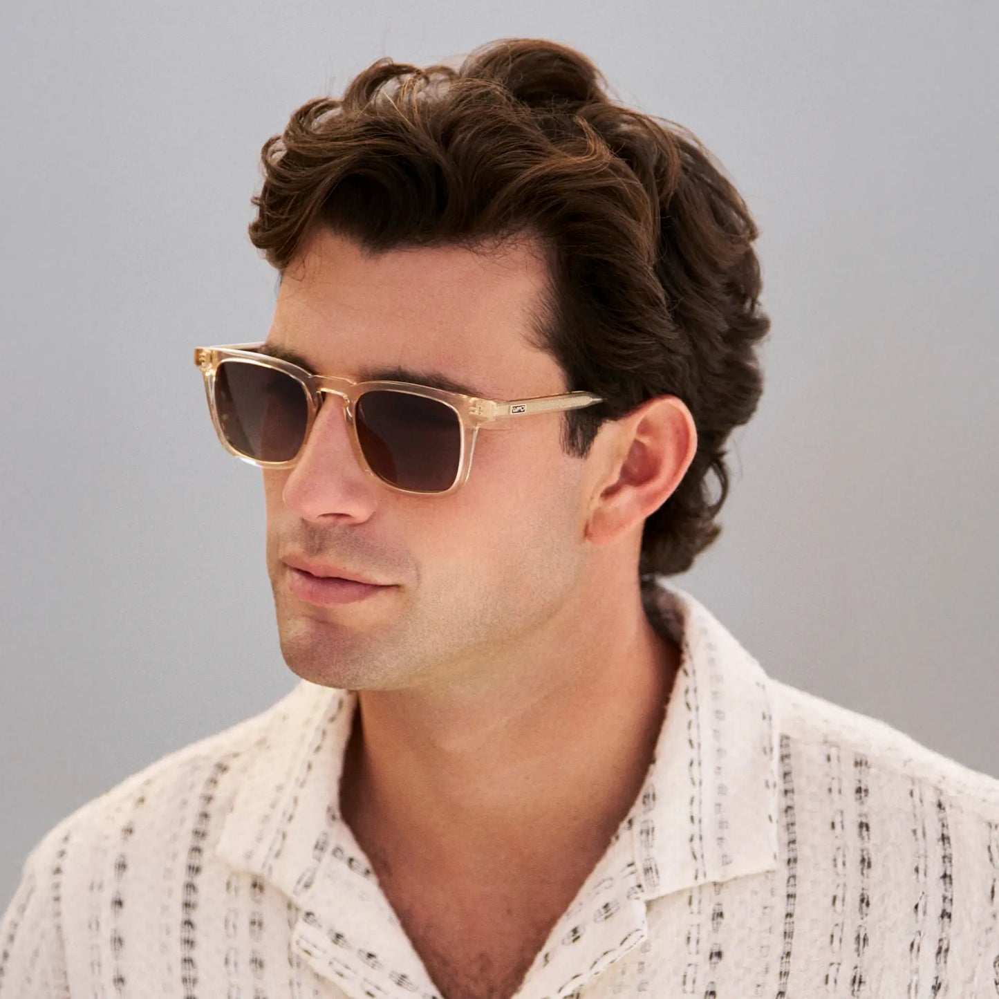 Sand Brown / Brown Gold Gradient Lens || Model wearing Men's Rectangular Polarized Sunglasses with Sand Brown Frame and Brown Gold Gradient Lenses