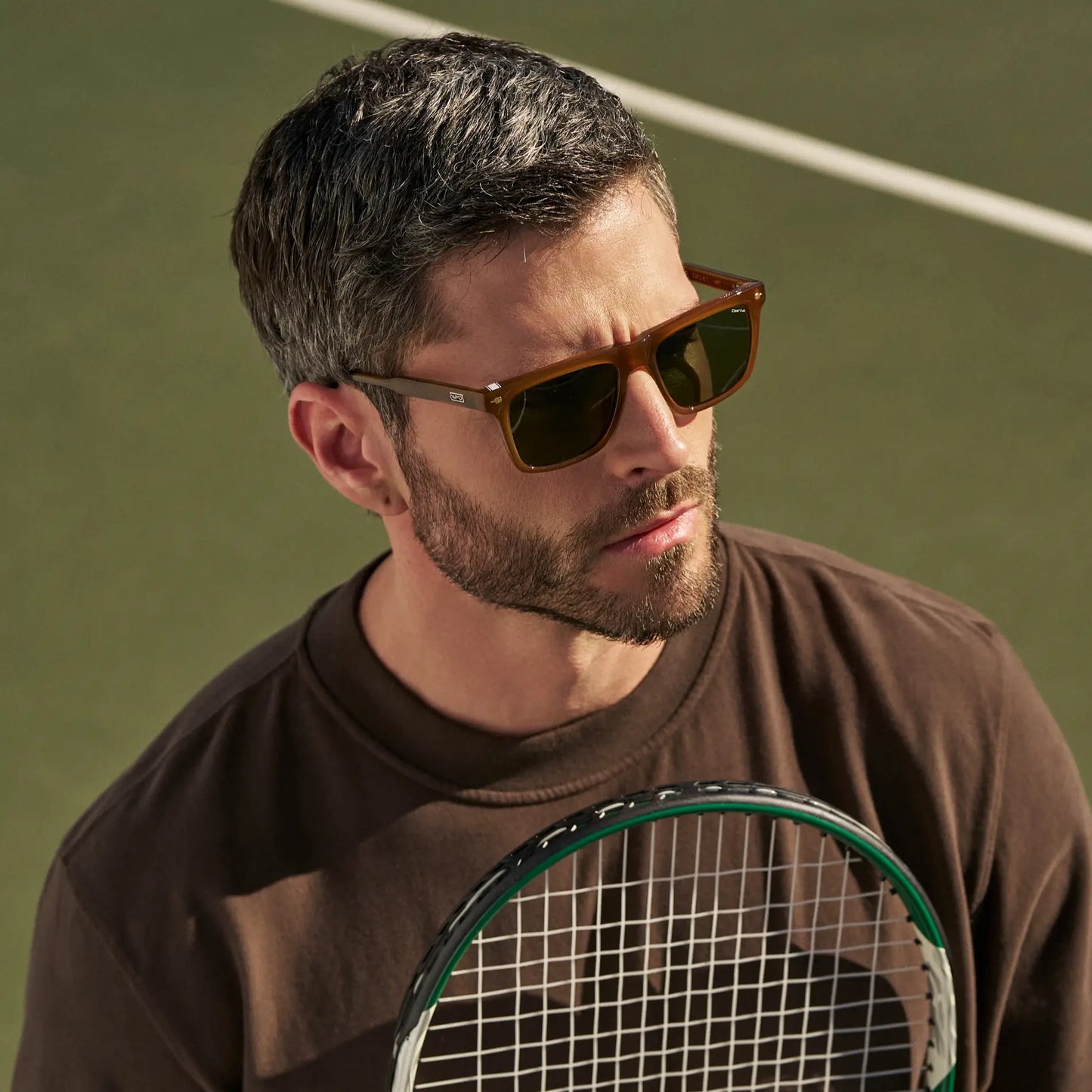 Dune Brown / Smoke Green Lens || Man wearing Classic Rectangular Sunglasses with Dune Brown Frame and Smoke Green Lens outdoors