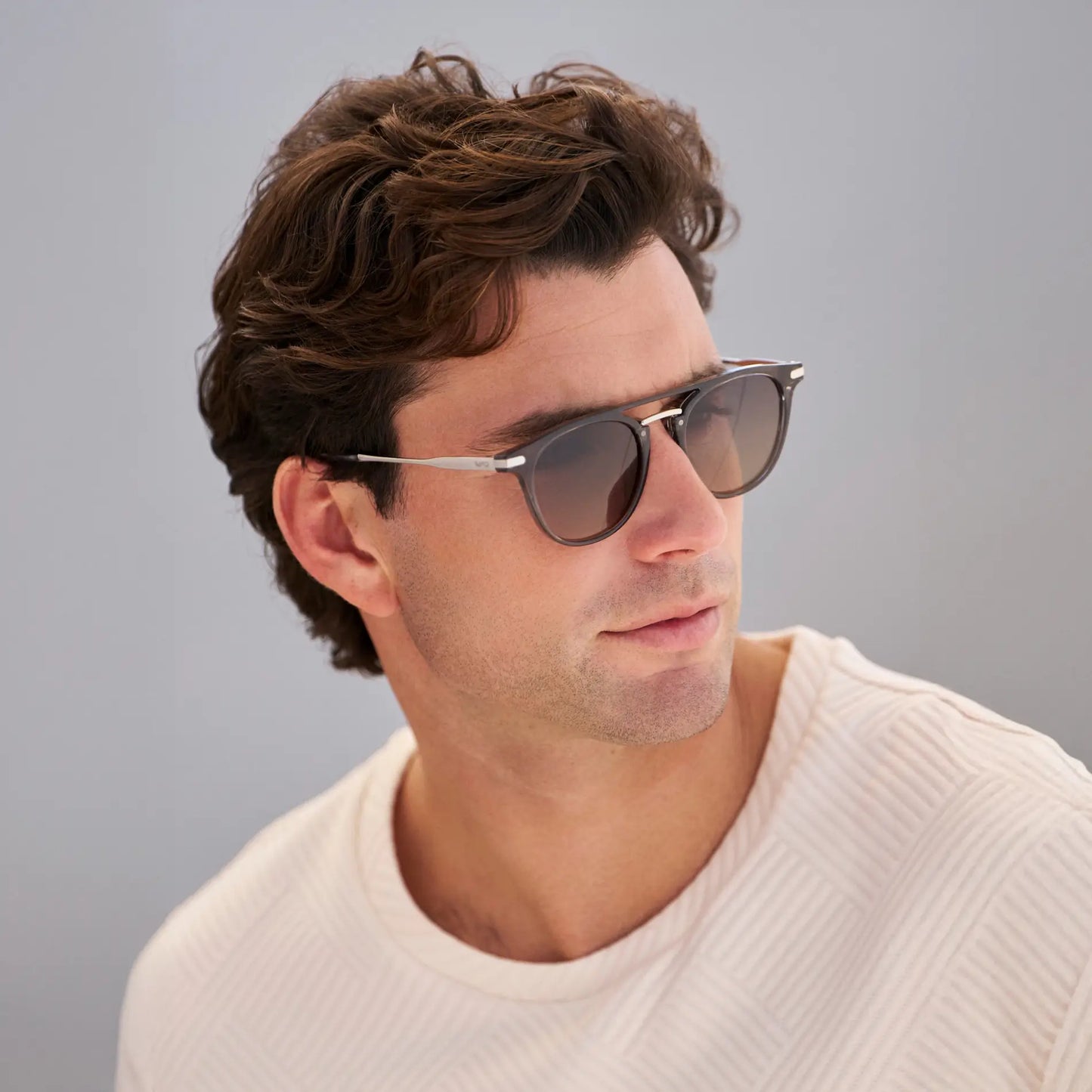 Smoke Grey / Grey Brown Gradient Lens || Model wearing Men's Round Polarized Sunglasses with Smoke Grey Metal Frame and Grey Brown Gradient Lenses