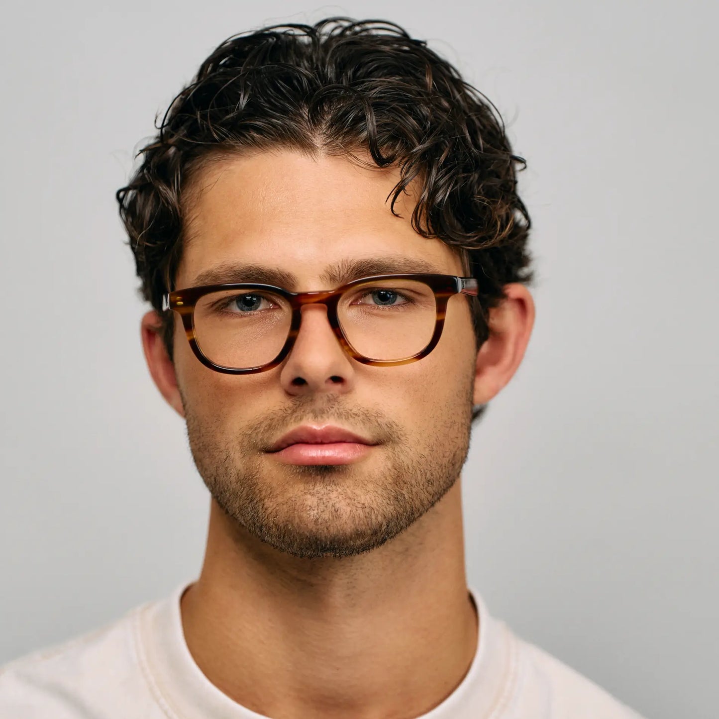 Golden Brown Grain || Male model wearing Men's Square Blue Light blocking glasses with Golden Brown Grain Acetate frame