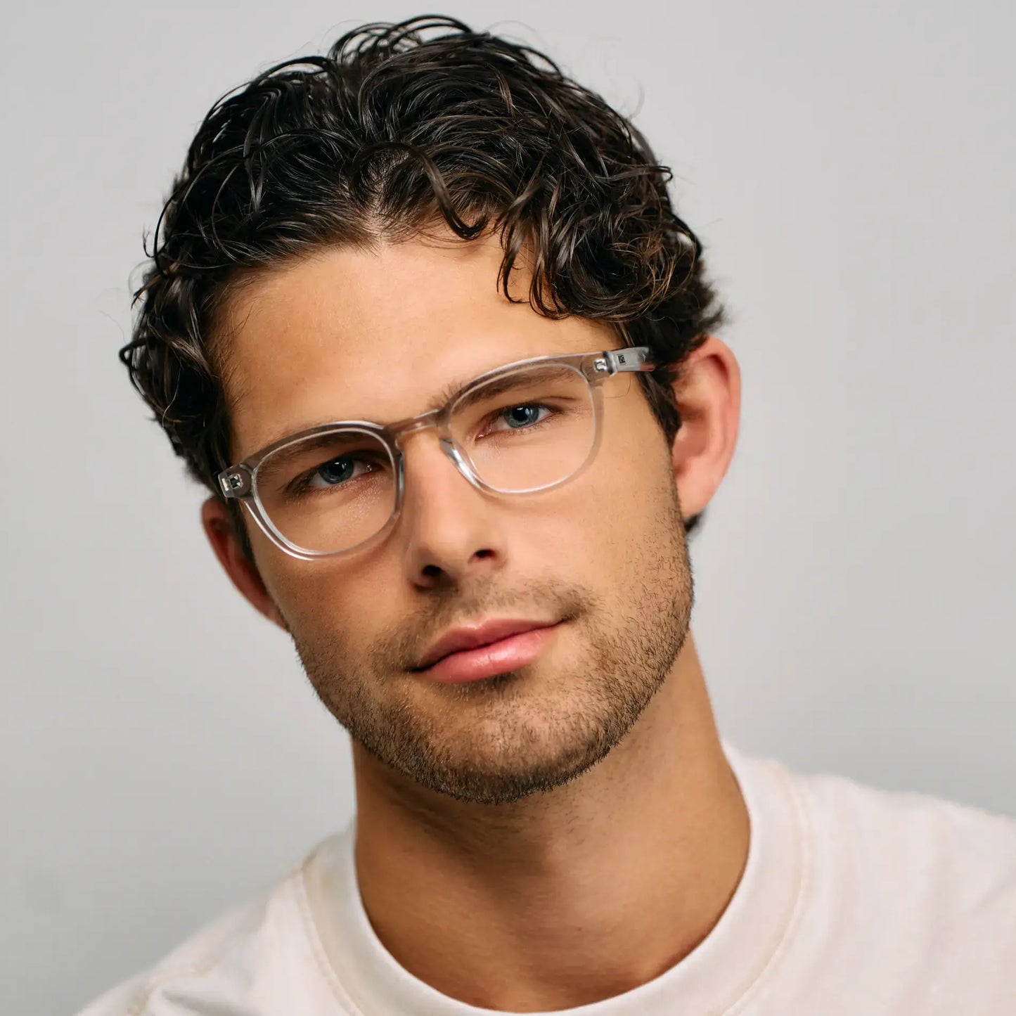 Ice Grey || Model wearing Men's Rounded Rectangular Prescription Eyeglasses with Ice Grey Acetate Frame and Clear Lens