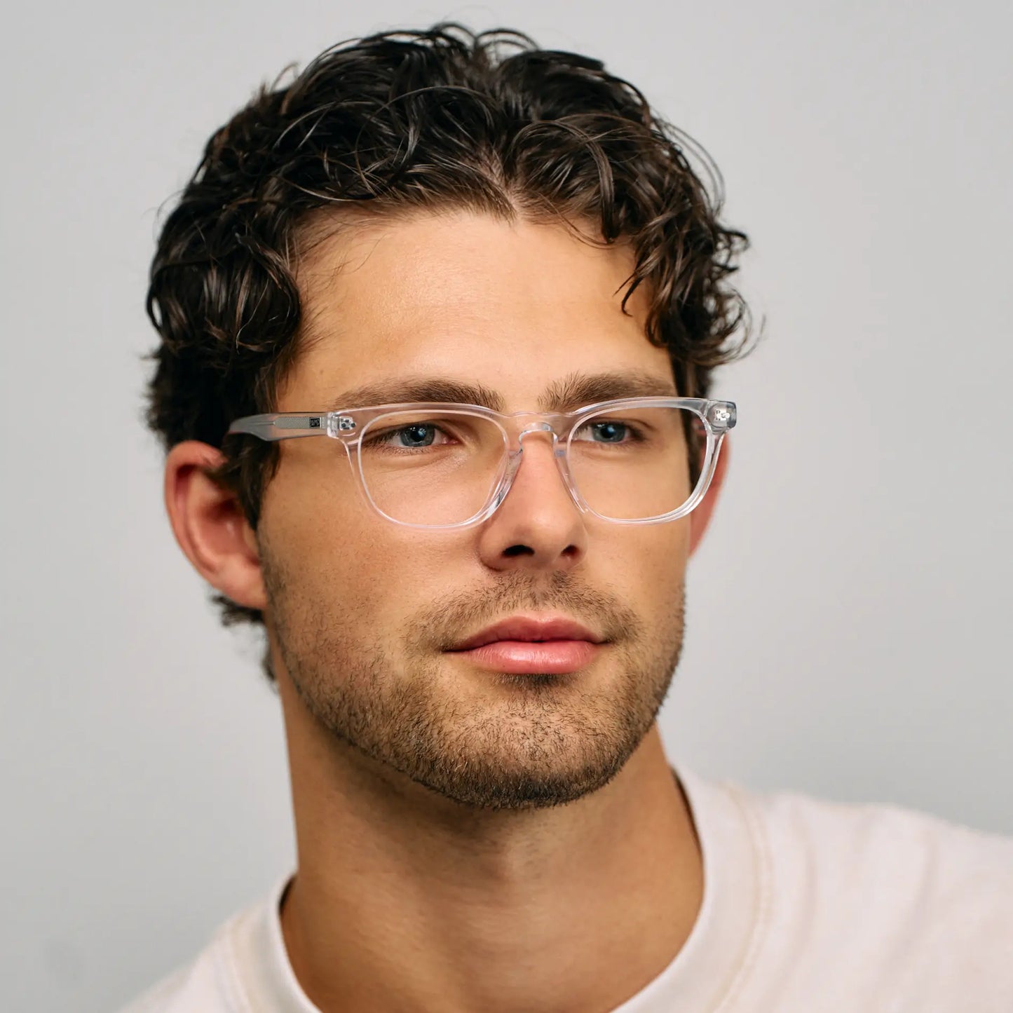 Clear || Male Model wearing Men's Rectangular Blue Light Blocking Glasses with Clear Acetate Frame and Clear Lens