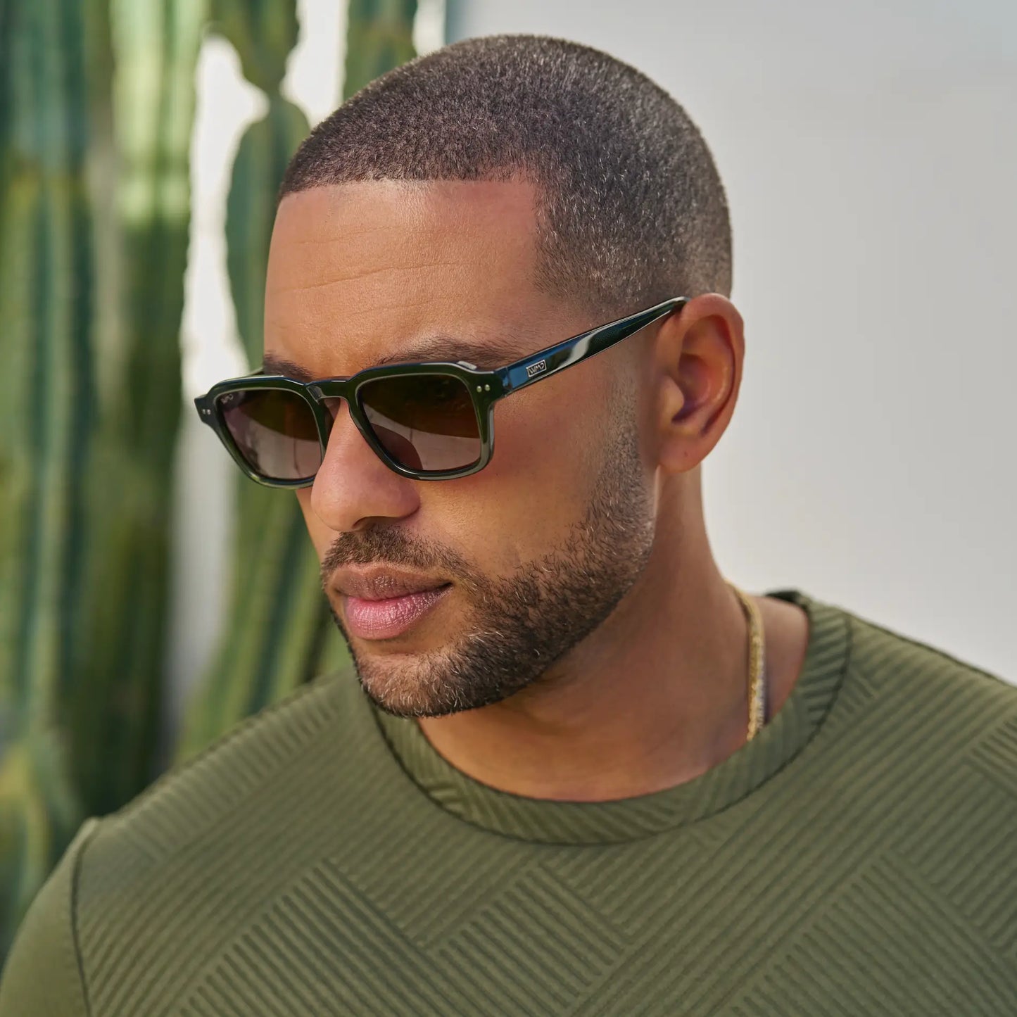 Jade Green / Brown Gold Gradient Lens || Model wearing Men's Rectangular Polarized Sunglasses with Jade Green Acetate Frame and Brown Gold Gradient Lens