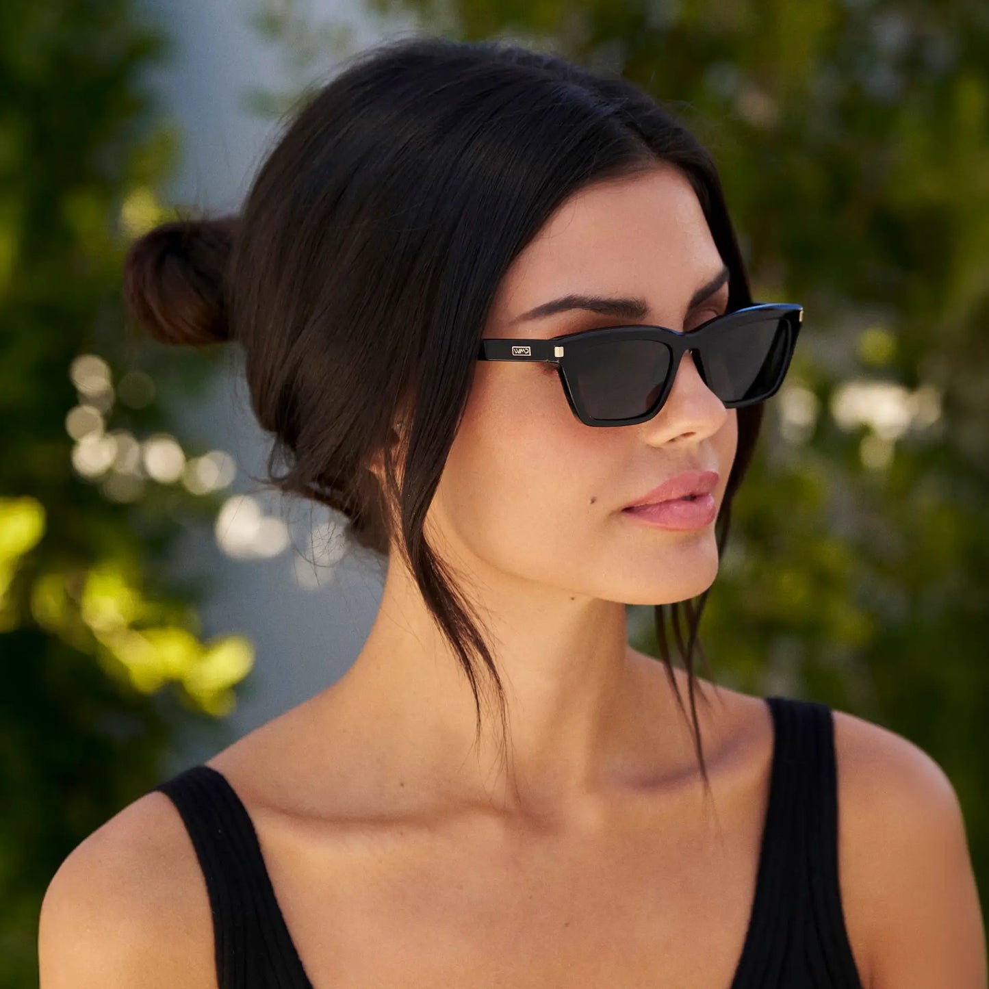 Black / Triple Black Lens || Model wearing Women's Cat Eye Polarized Sunglasses with Black Frame and Black Lenses