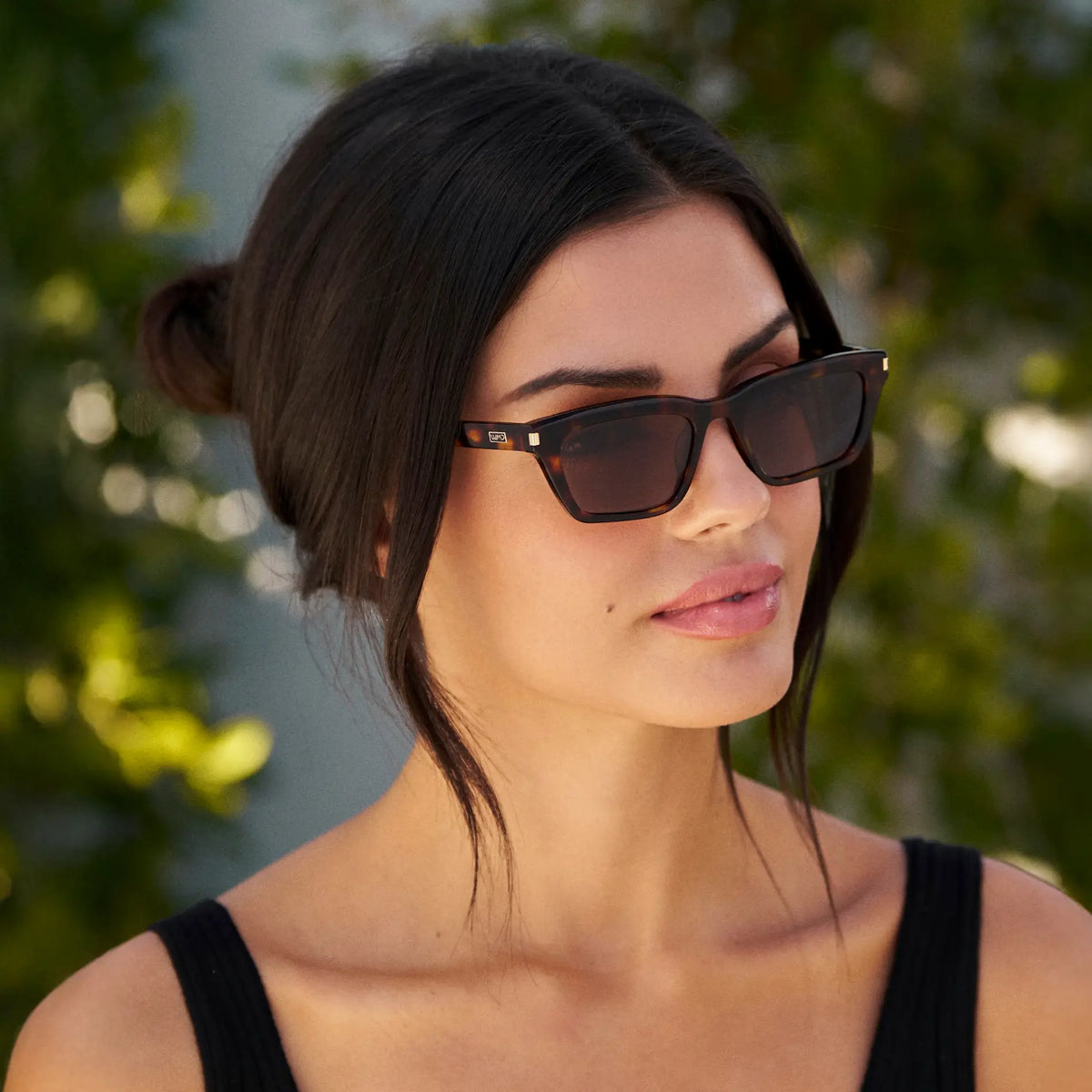 Brown Tortoise / Amber || Women's Cat Eye Prescription Sunglasses with Brown Tortoise Frame and Amber Lenses worn by a woman outdoors