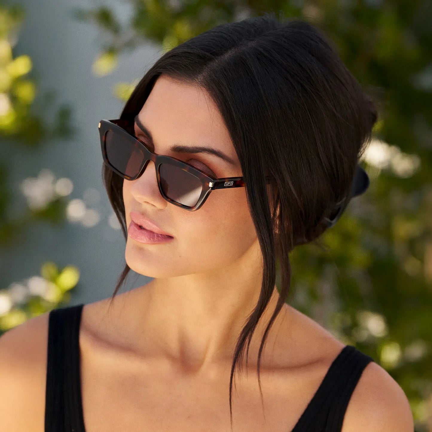 Brown Tortoise / Brown Lens || Model wearing Women's Cat Eye Polarized Sunglasses with Brown Tortoise Frame and Brown Lenses
