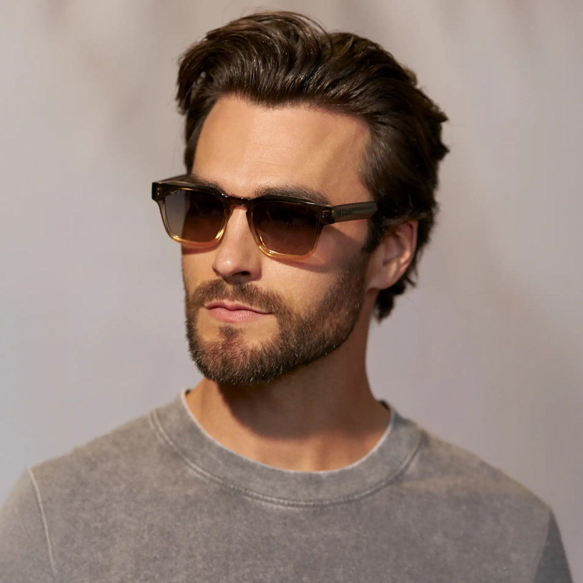 Graphite Horizon Grey / Grey || Model wearing Men's Geometric Rectangular Prescription Sunglasses with Grey Acetate Frame and Grey Prescription Lens