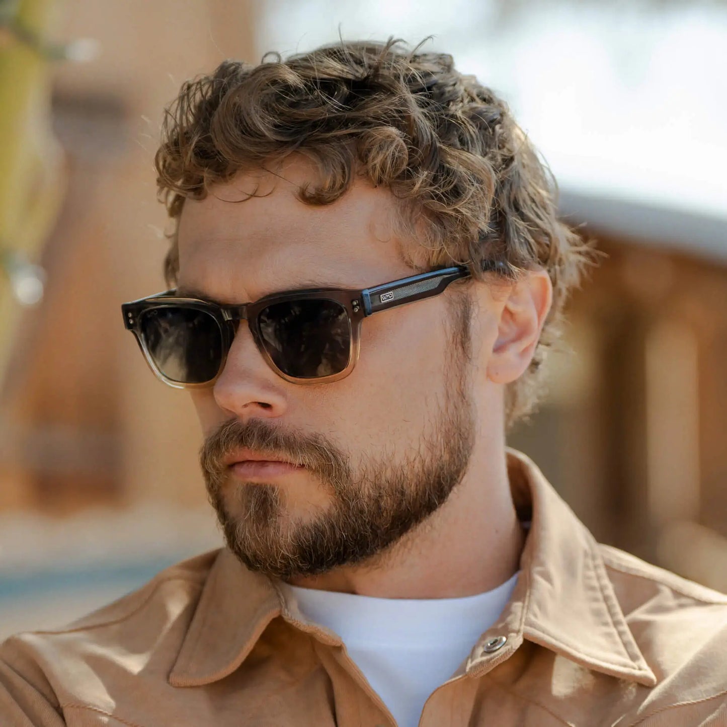 Graphite Horizon Grey / Grey || Model wearing Men's Geometric Rectangular Prescription Sunglasses with Grey Acetate Frame and Grey Prescription Lens