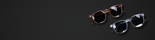 Two pairs of sunglasses displayed on a black background