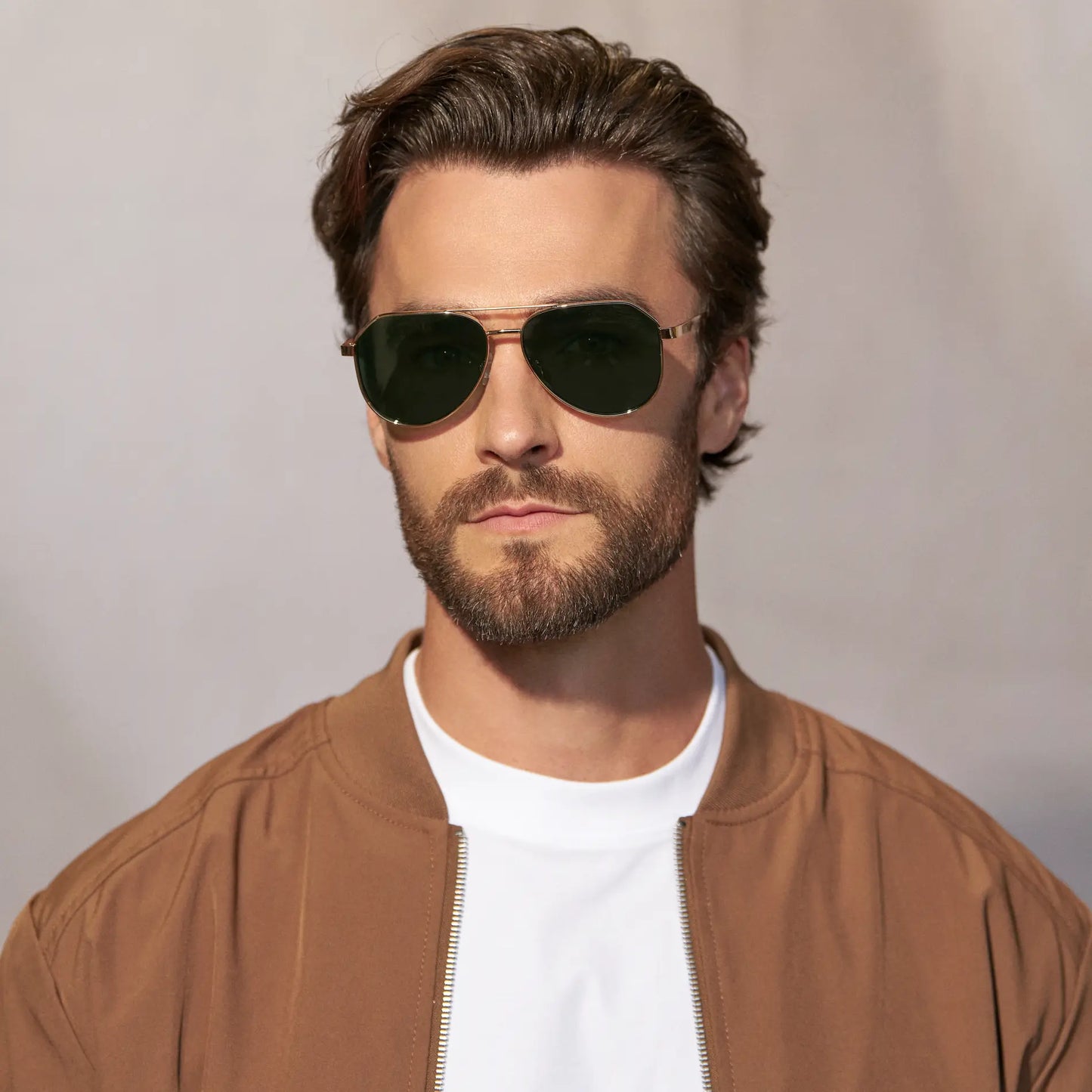 Gold / Smoke Green Lens || Model wearing Men's Stainless Steel Aviator Sunglasses with Gold Frame and Smoke Green Lens 
