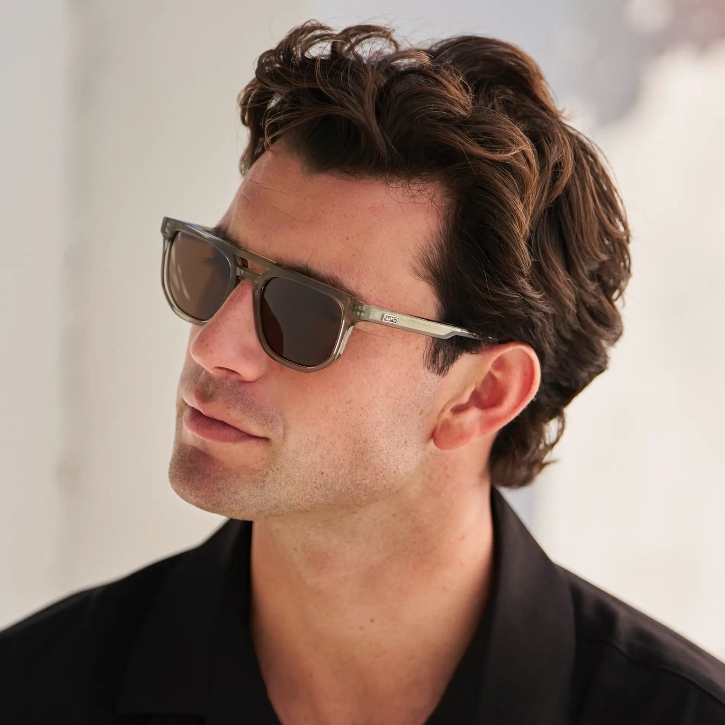 Palm Green / Dark Brown Lens || Model wearing Men's Rectangular Double Bridge Aviator Polarized Sunglasses with Green Frame and Brown Lenses on a white background