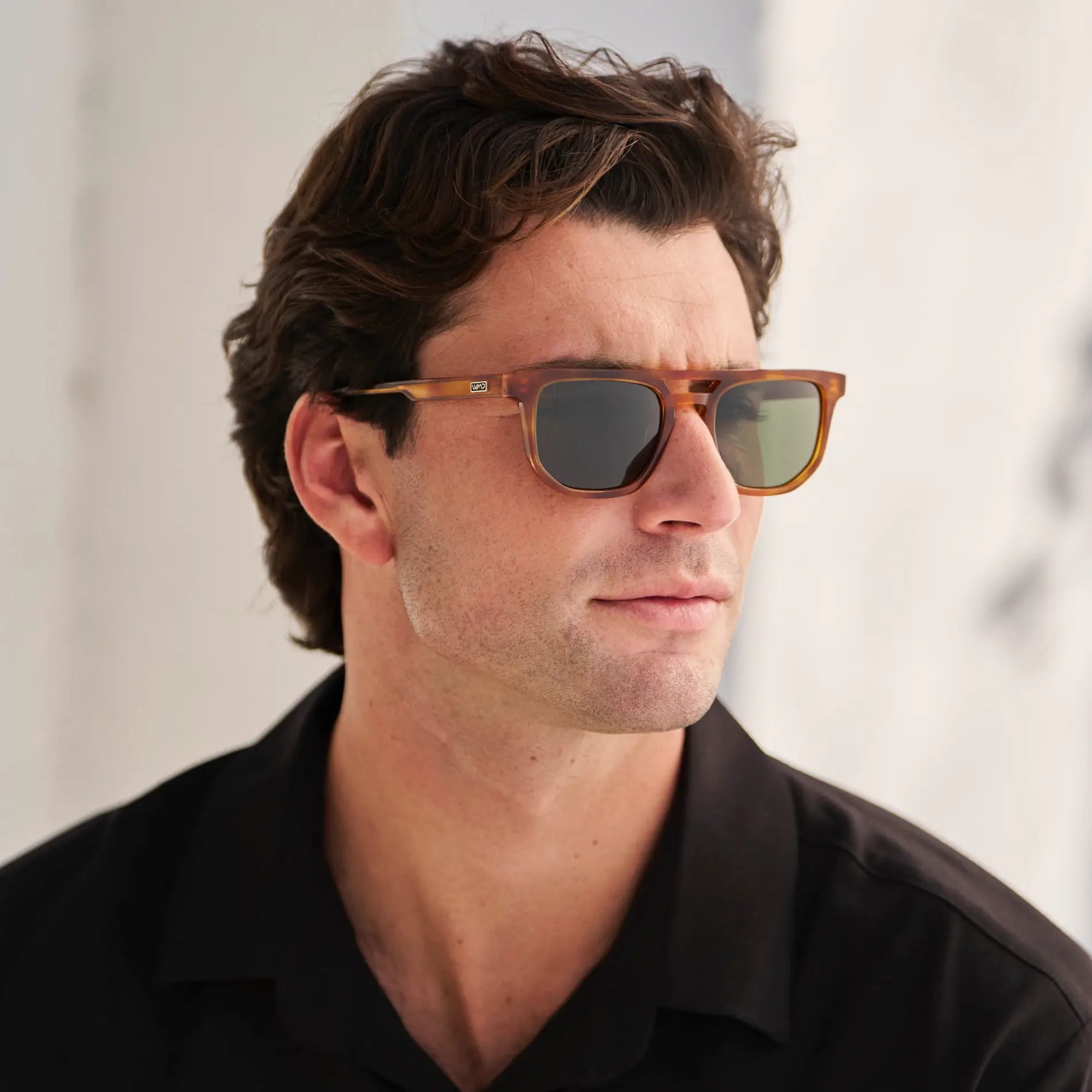 Honey Tortoise / G15 || Model wearing Men's Rectangular Double Bridge Aviator Prescription Sunglasses with Honey Tortoise Frame and Green Lenses on a white background