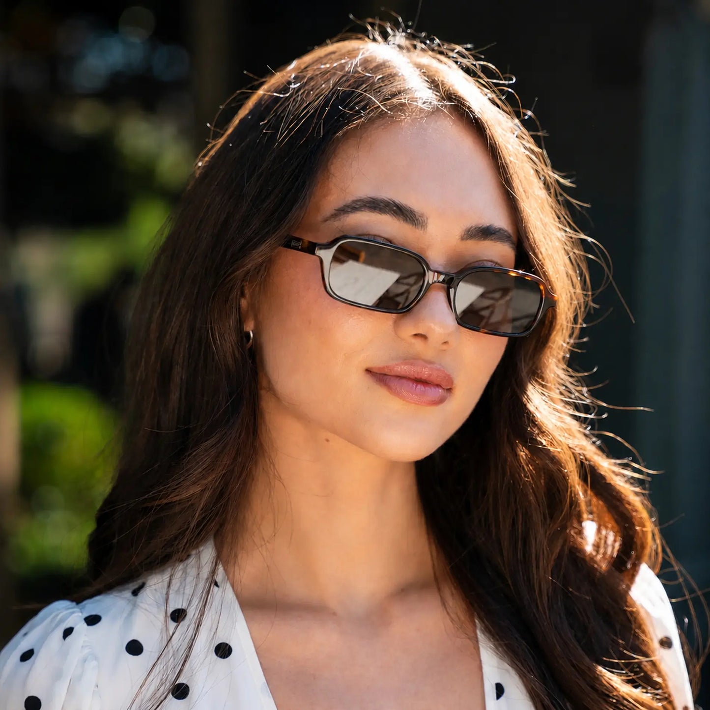 Brown Tortoise / Brown Lens || Model wearing Women's Rectangular Sunglasses with Brown Tortoise Frame and Anti-Reflective Brown Lenses
