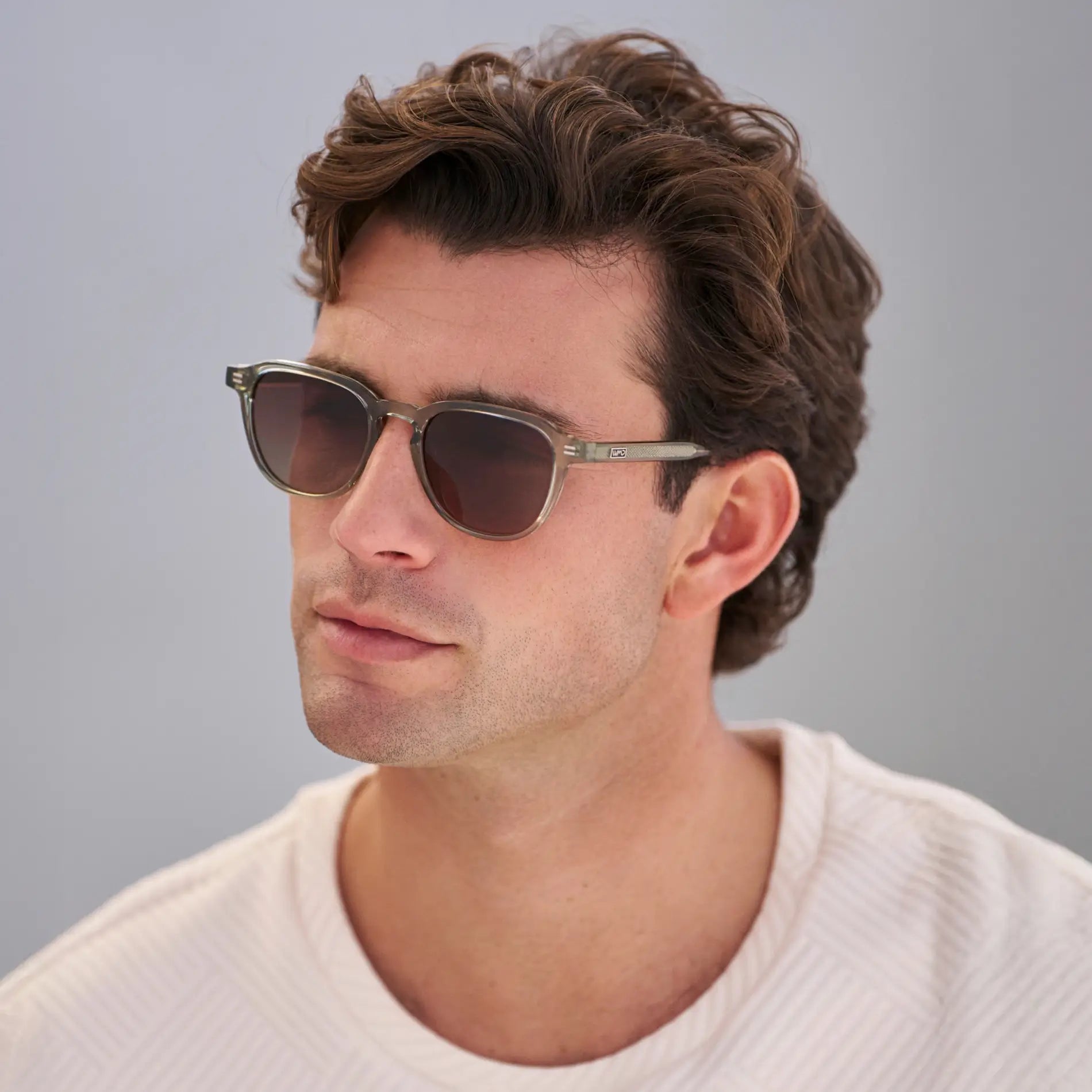 Palm Green / Brown Gold Gradient Lens || Model wearing Men's Round Polarized Sunglasses with Green Frame and Brown Gold Lenses