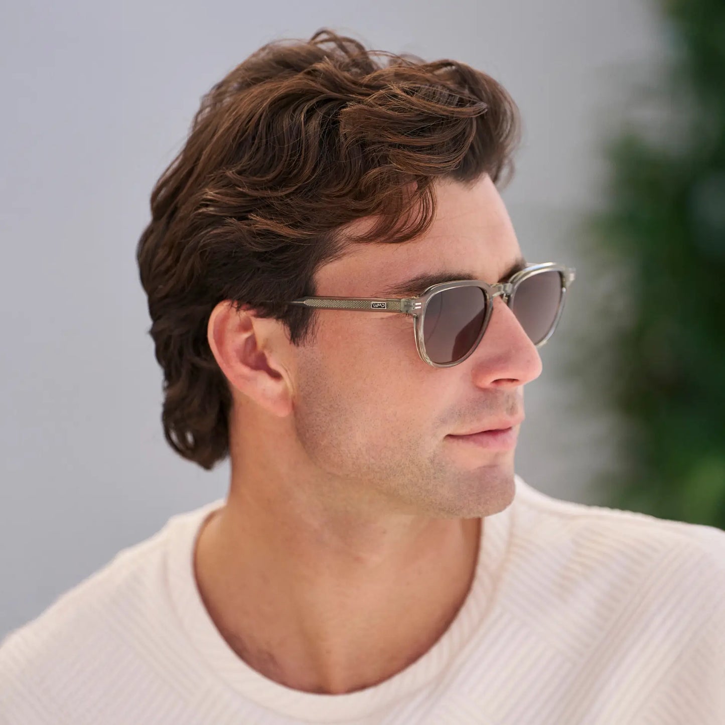 Palm Green / Brown Gold Gradient Lens || Model wearing Men's Round Polarized Sunglasses with Green Frame and Brown Gold Lenses