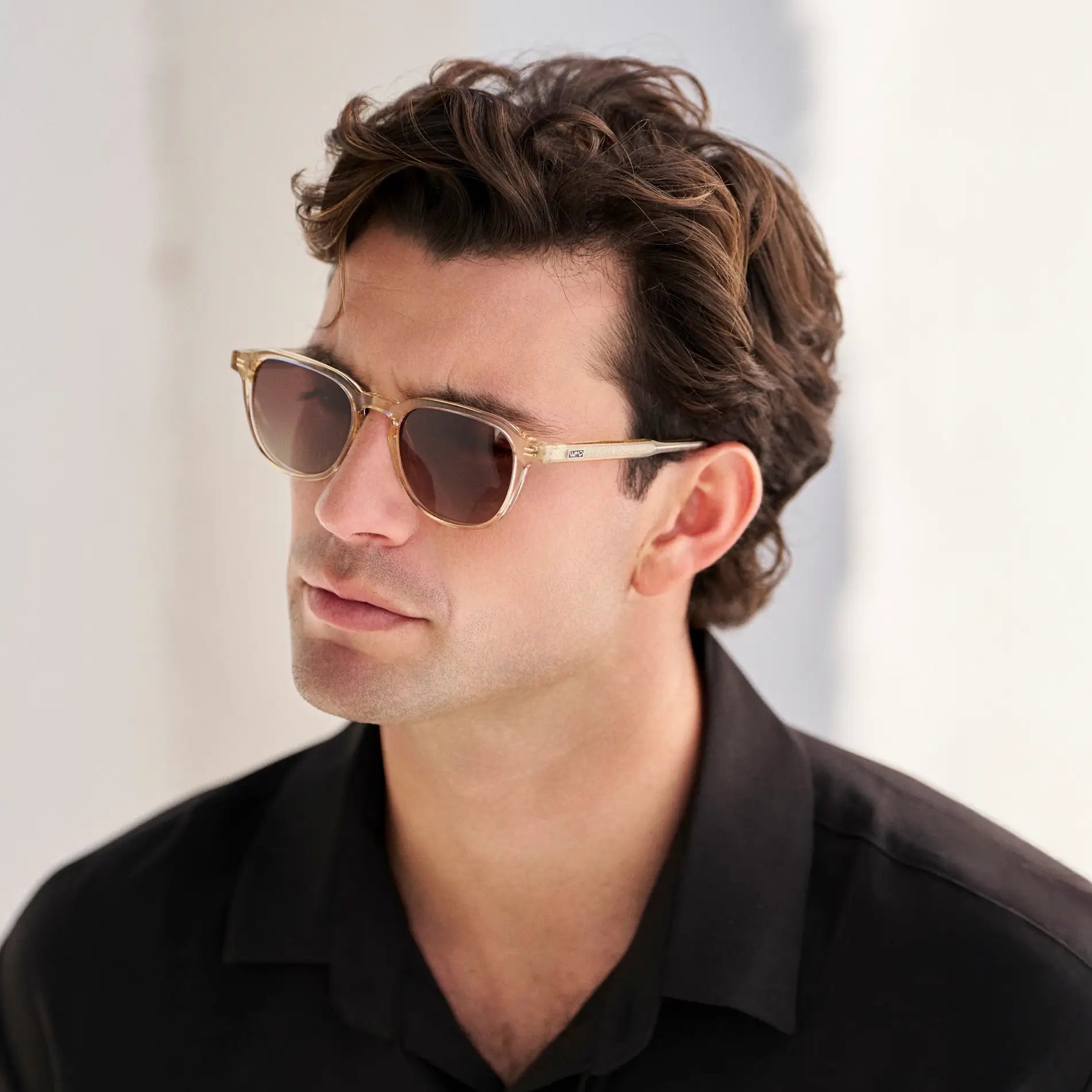 Sand Brown / Brown Gradient Lens || Model wearing Men's Round Polarized Sunglasses with Sand Brown Frame and Brown Gradient Lenses