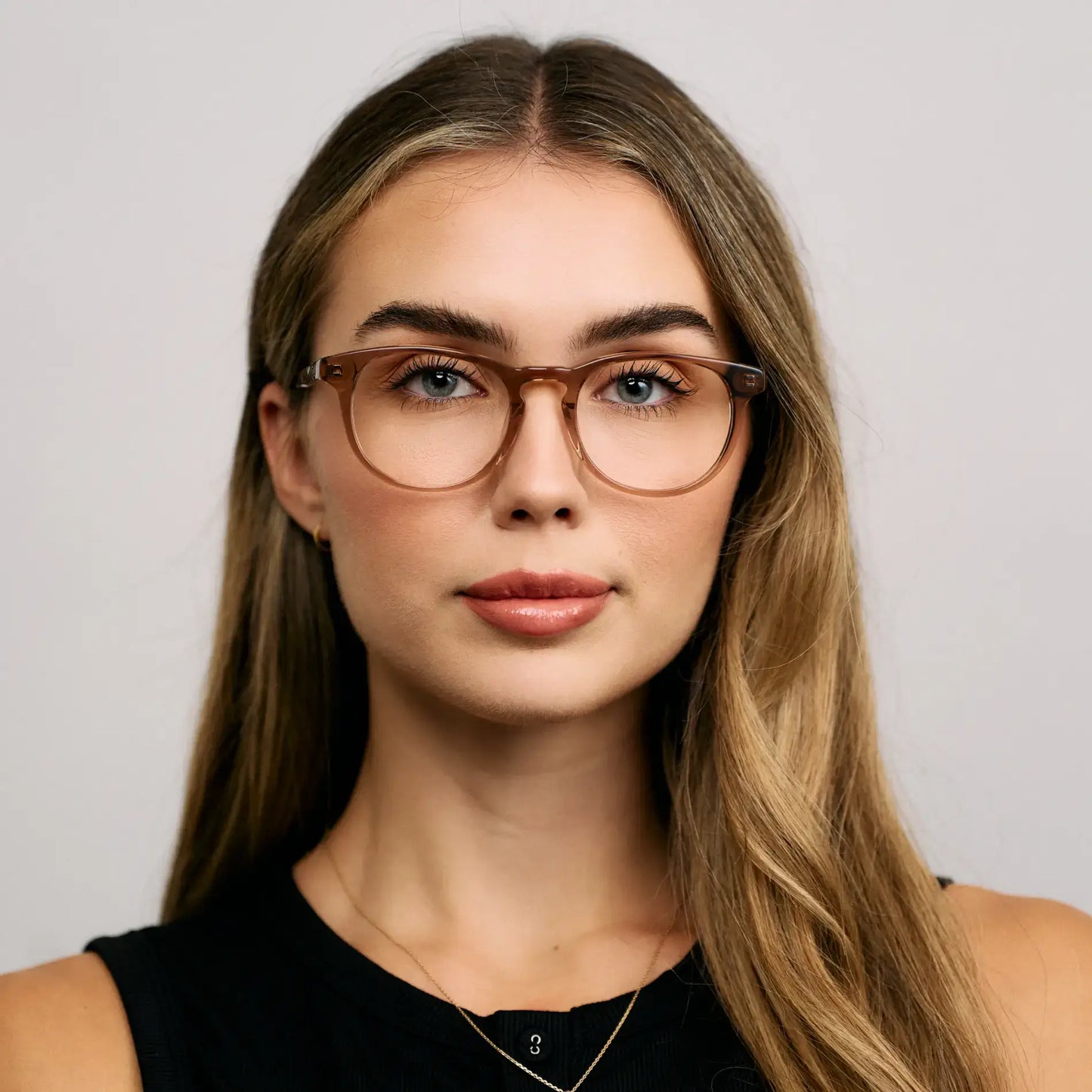 Light Brown || Model wearing Women's Retro-Inspired Oval Prescription Glasses with a Light Brown Acetate Frame and Clear Lens