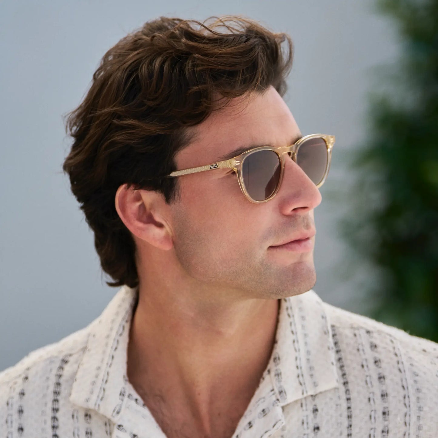 Sand Brown / Brown Gradient Lens || Model wearing Men's Round Polarized Sunglasses with Sand Brown Frame and Brown Gradient Lenses