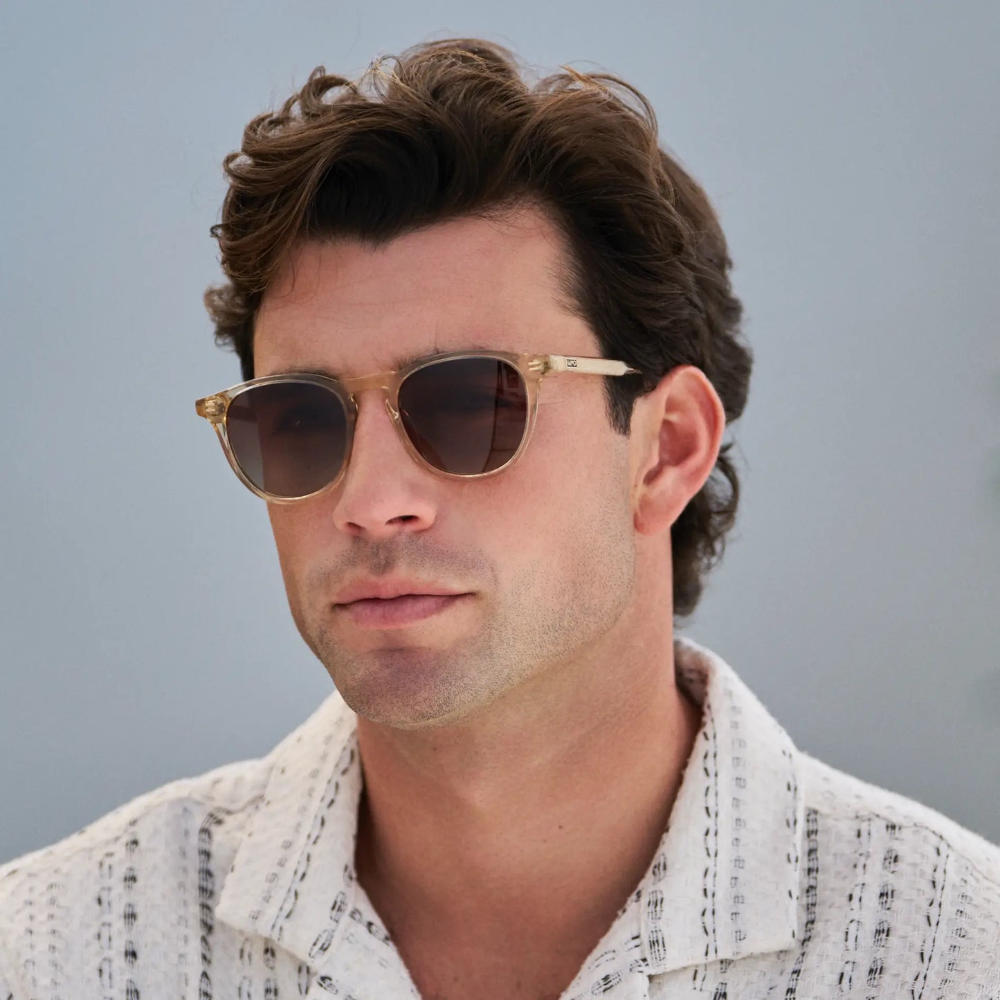 Sand Brown / Brown Gradient Lens || Model wearing Men's Round Polarized Sunglasses with Sand Brown Frame and Brown Gradient Lenses