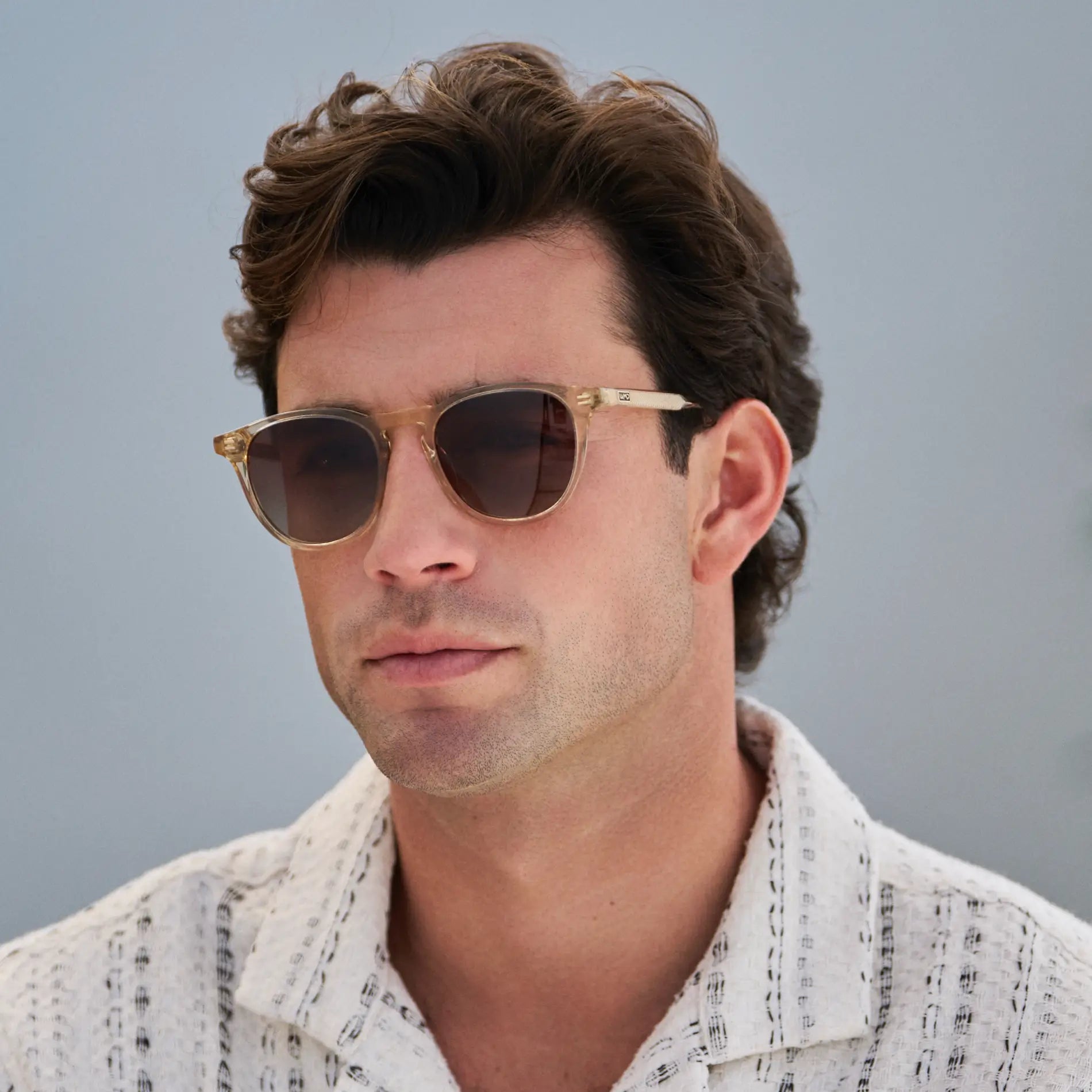 Sand Brown / Brown Gradient Lens || Model wearing Men's Round Polarized Sunglasses with Sand Brown Frame and Brown Gradient Lenses