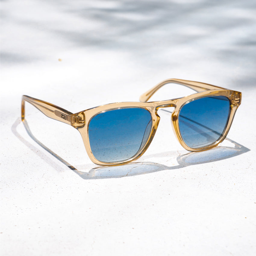 Champagne Crystal / Blue Gradient Lens || Sleek and thick square frame polarized sunglasses for men with a acetate frame in champagne crystal frame and gradient blue lenses