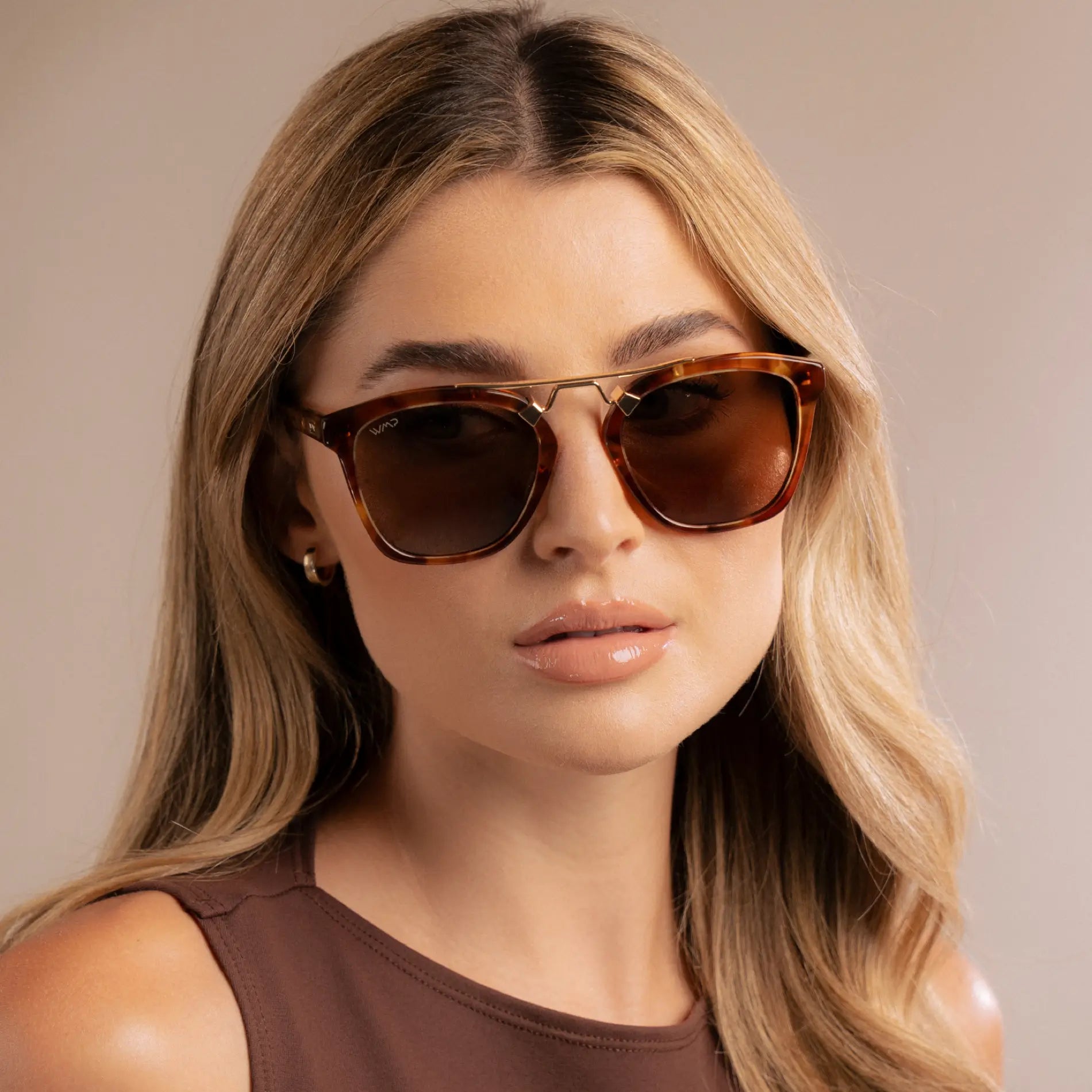 Honeycomb Tortoise / Brown Lens || Model wearing Women's Trendy Honeycomb Tortoise Frame Sunglasses with Brown Polarized Lens