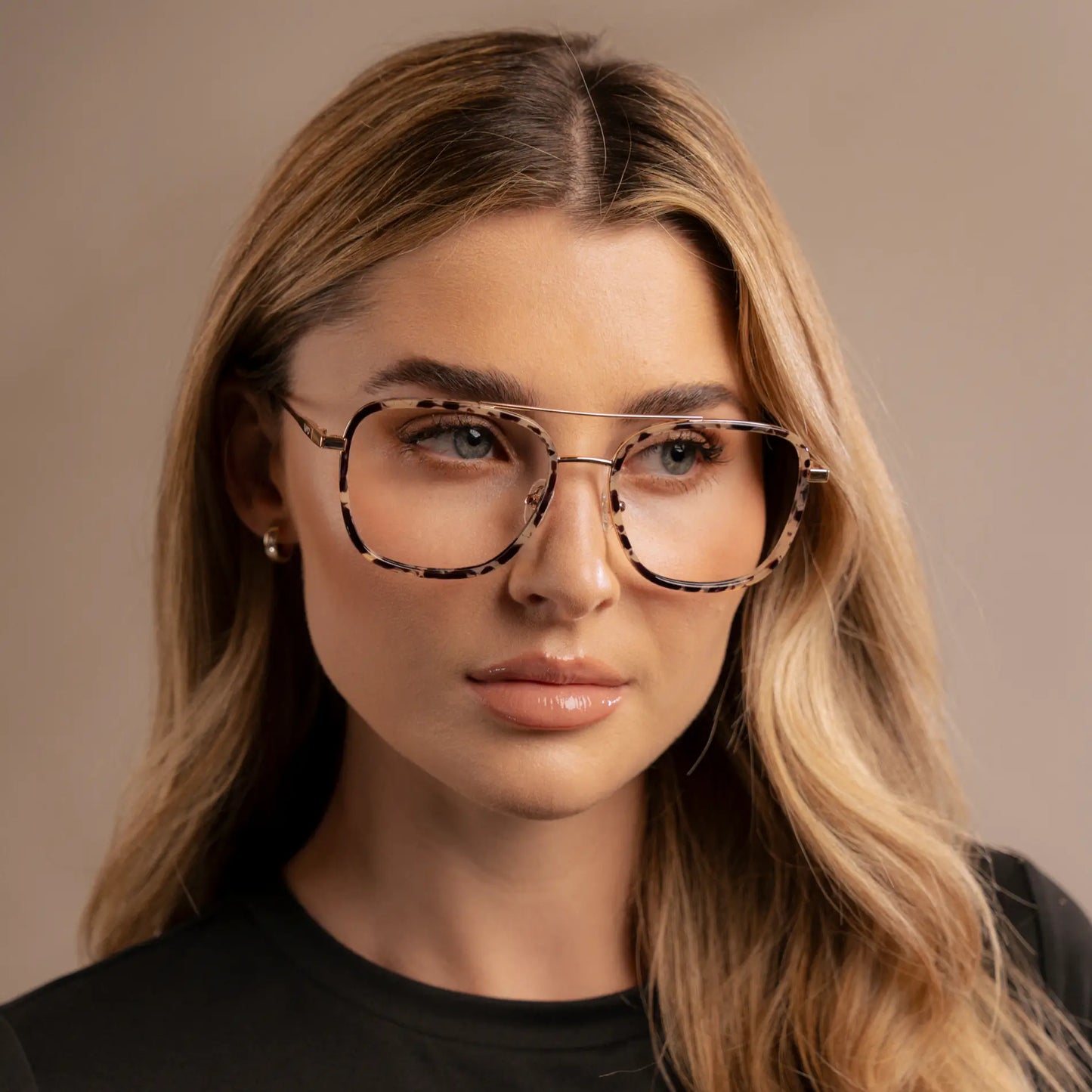 Beige Tortoise || Woman wearing Oversized Square Aviator Prescription Eyeglasses with Beige Tortoise Acetate and Stainless Steel Frame and Clear Lenses