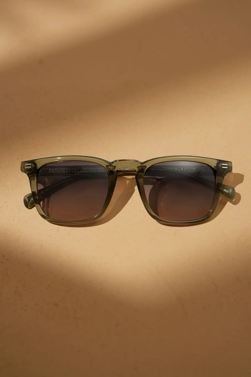 WMP Eyewear Grant polarized sunglasses in translucent khaki green with gradient grey-brown lenses