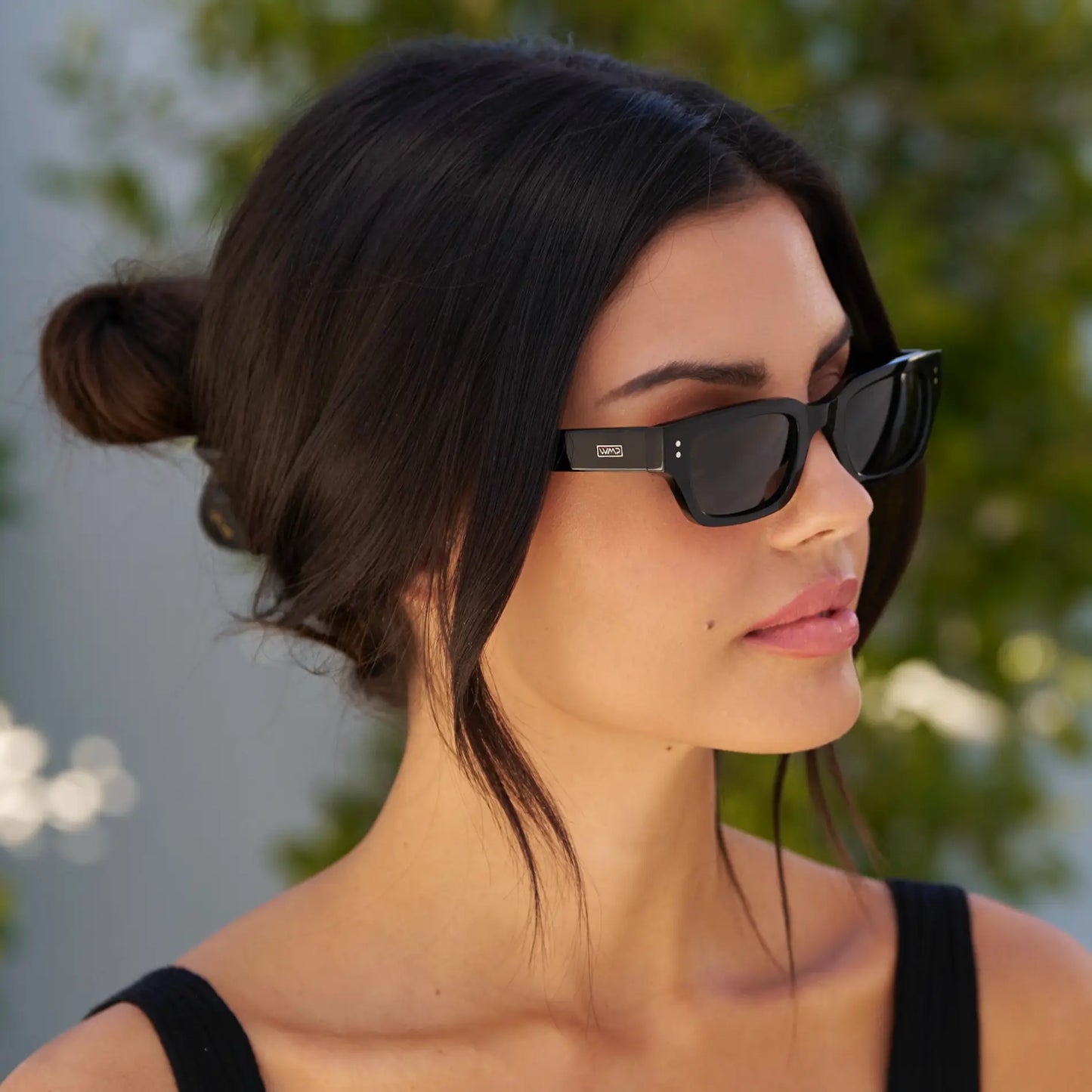 Black / Triple Black Lens || Model wearing Women's Rectangular Polarized Sunglasses with Black Frame and Black Lenses