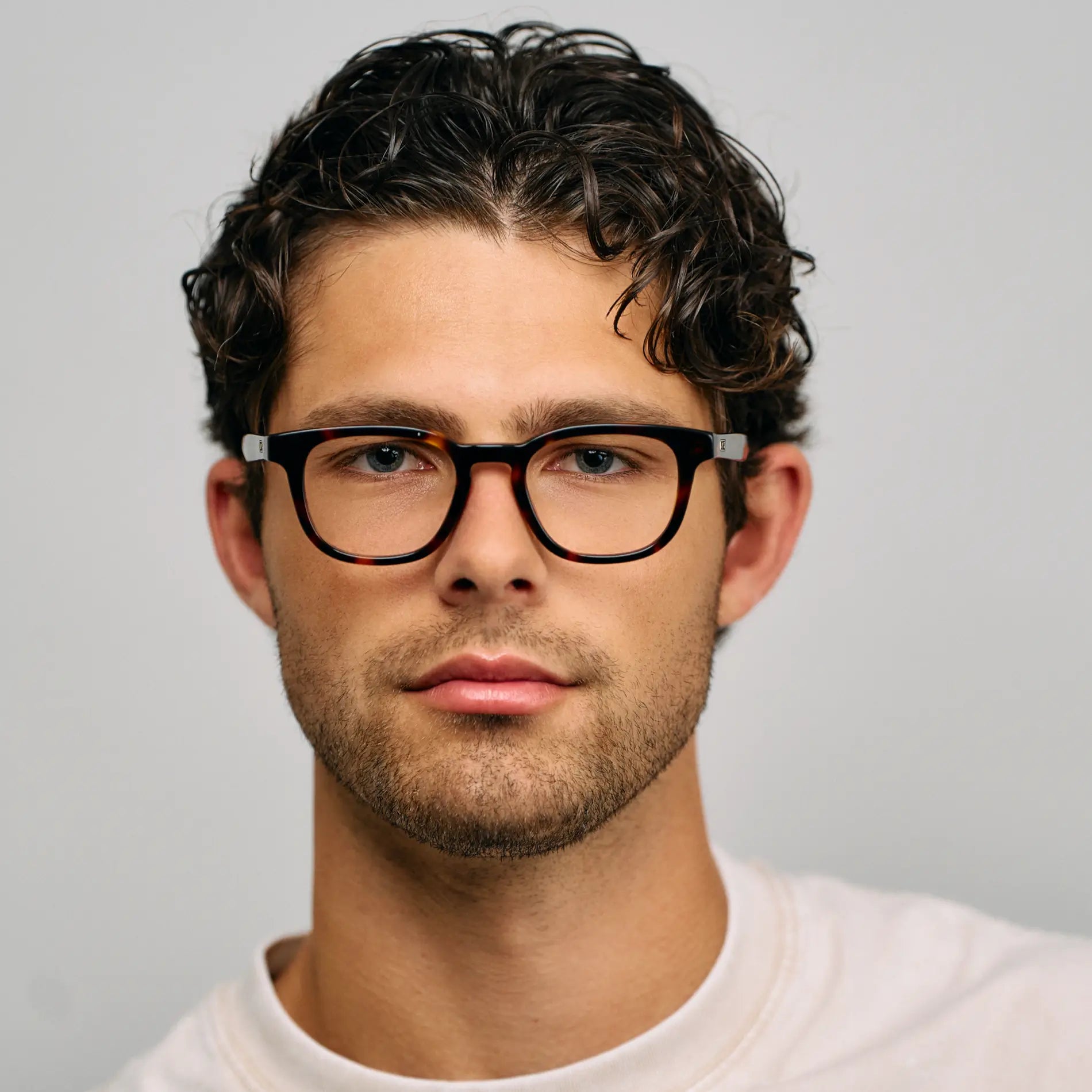 Brown Tortoise || Male model wearing Men's Square Blue Light blocking glasses with Brown Tortoise Acetate frame 