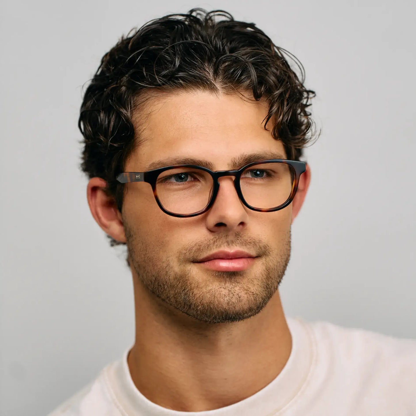 Brown Tortoise || Model wearing Men's Rounded Rectangular Prescription Eyeglasses with Brown Tortoise Acetate Frame and Clear Lens