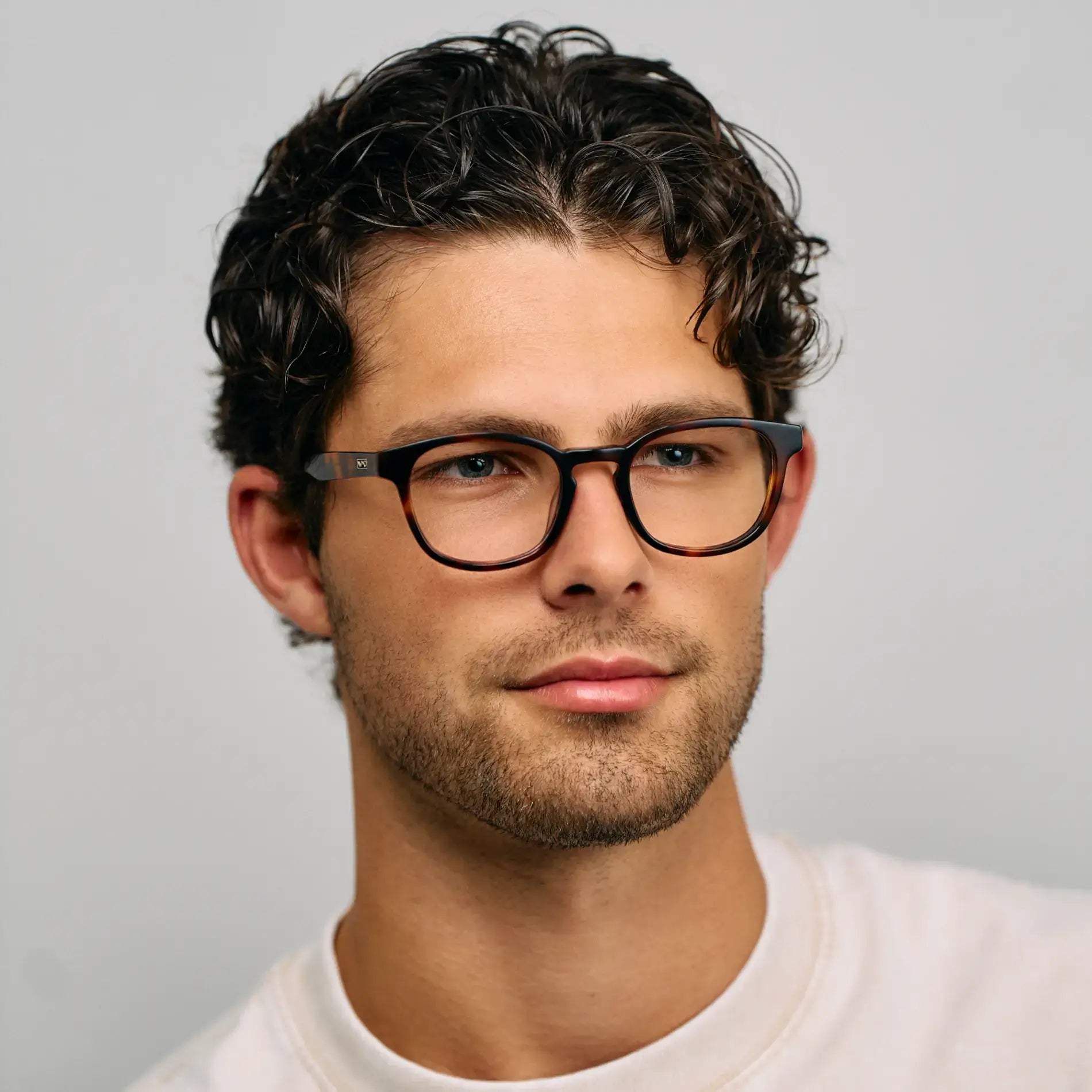 Brown Tortoise || Model wearing Men's Rounded Rectangular Prescription Eyeglasses with Brown Tortoise Acetate Frame and Clear Lens