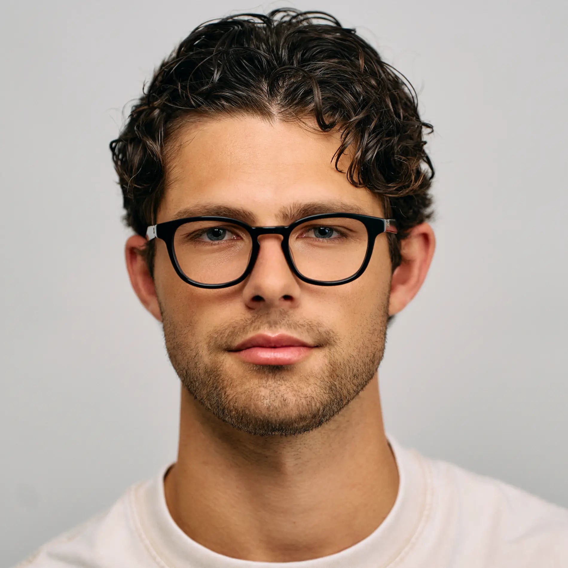 Black || Male Model wearing Men's Rounded Rectangular Blue Light Blocking Glasses with Black Acetate frame