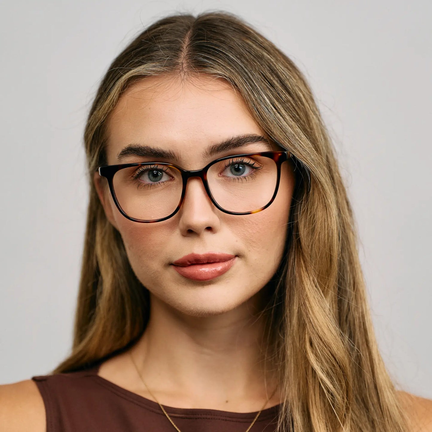 Brown Tortoise || Female Model wearing Women's Rectangular Blue Light Blocking Glasses with a Brown Tortoise Acetate Frame and Clear Lens