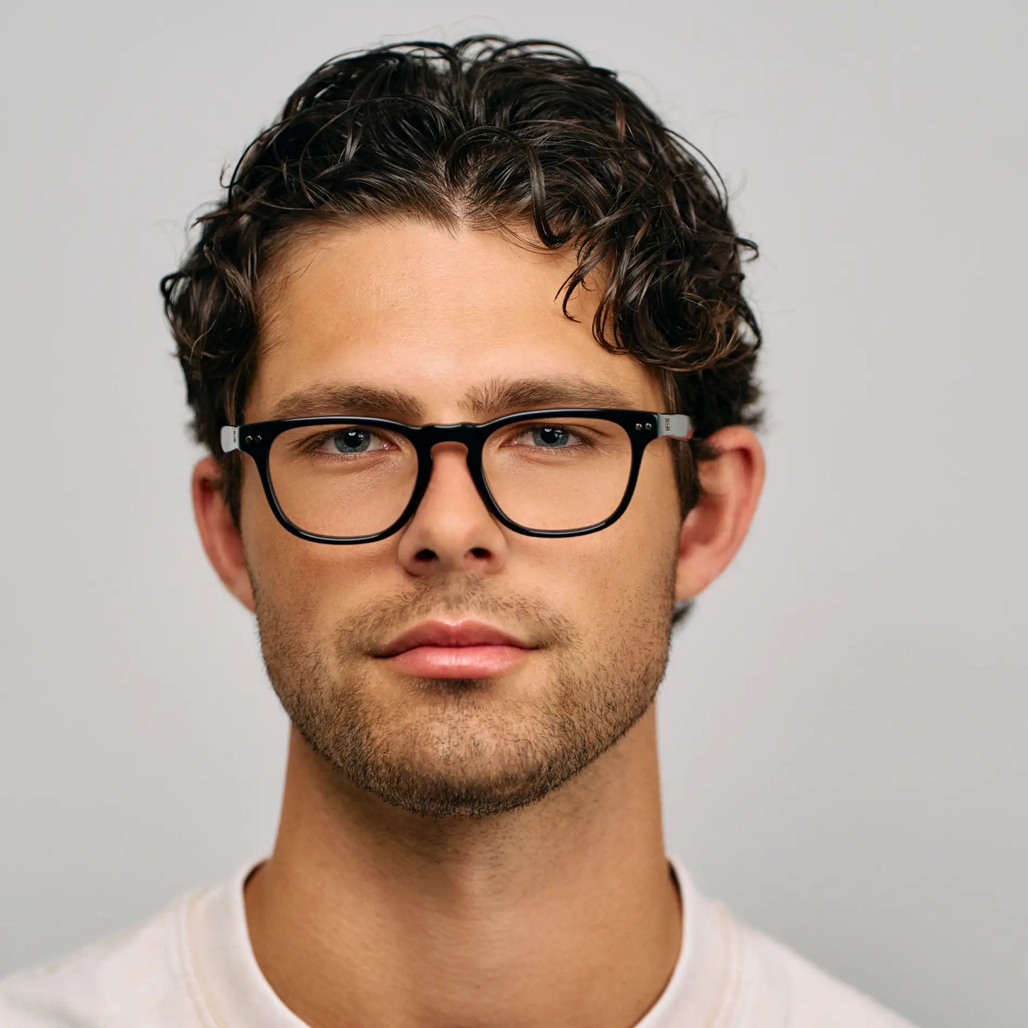 Black || Male Model wearing Men's Rectangular Blue Light Blocking Glasses with Black Acetate Frame and Clear Lens