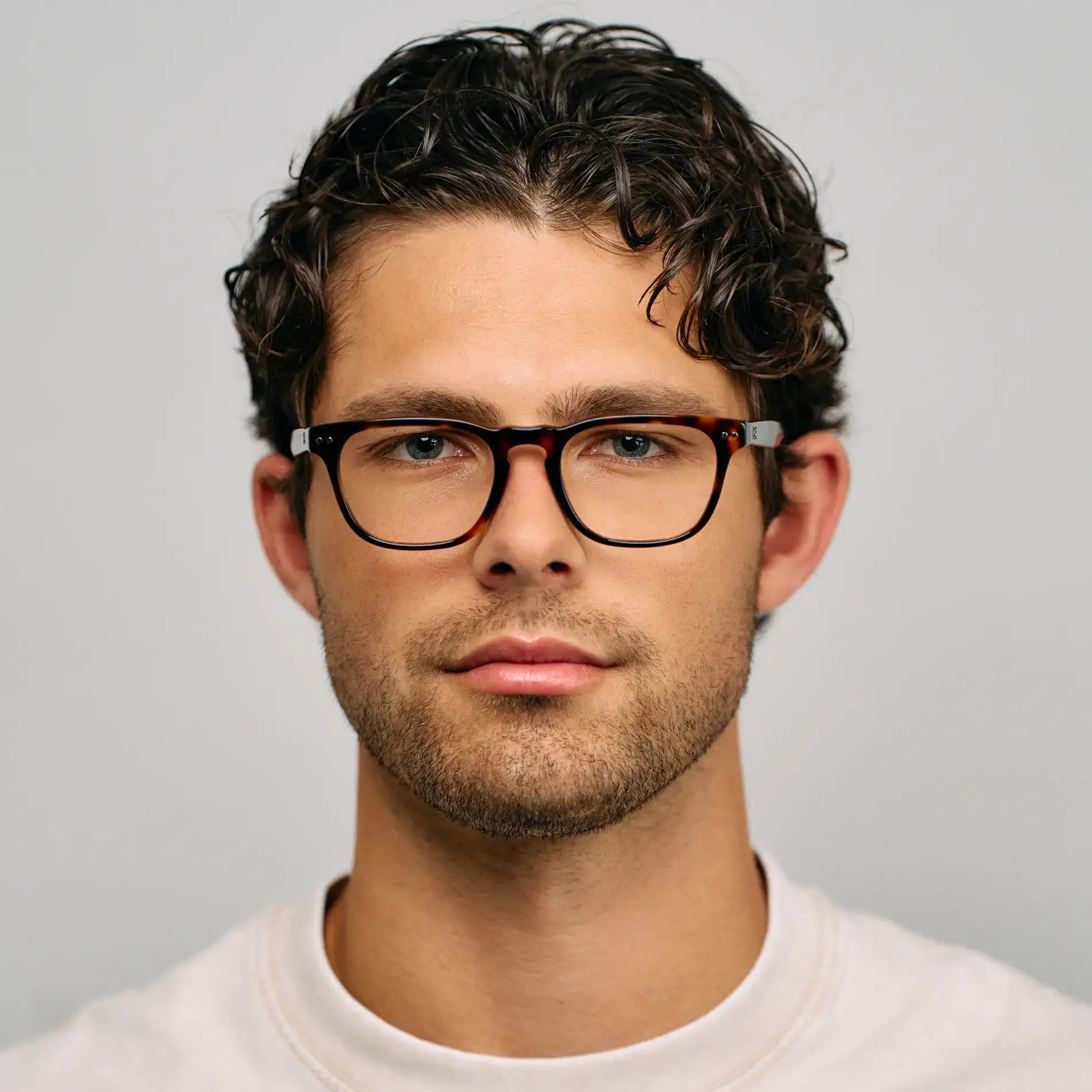 Brown Tortoise || Model wearing Men's Rectangular Prescription Glasses with Brown Tortoise Acetate Frame and Clear Lens