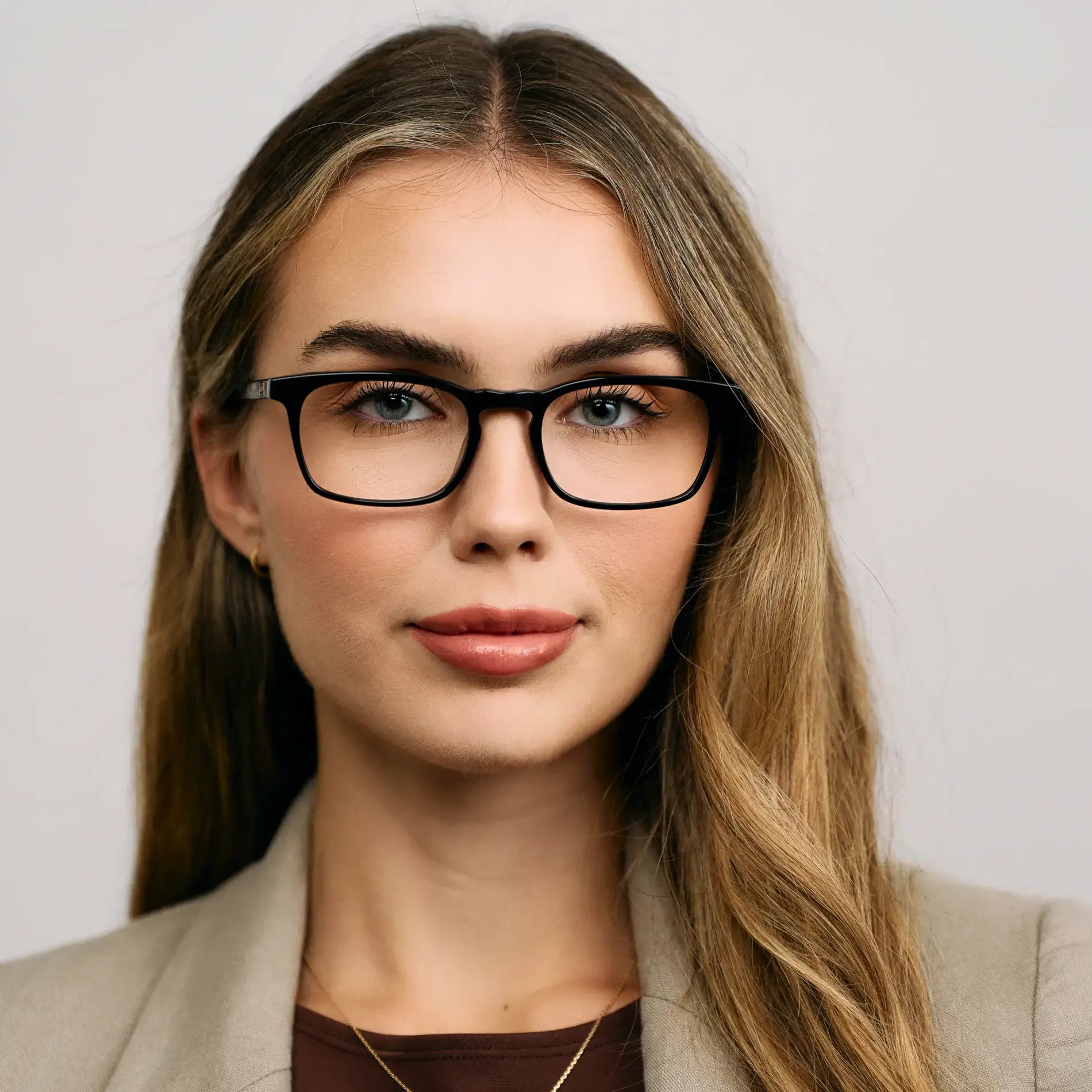 Black || Model wearing Women's Rectangular Prescription Glasses with a Black Acetate Frame and Clear Lens