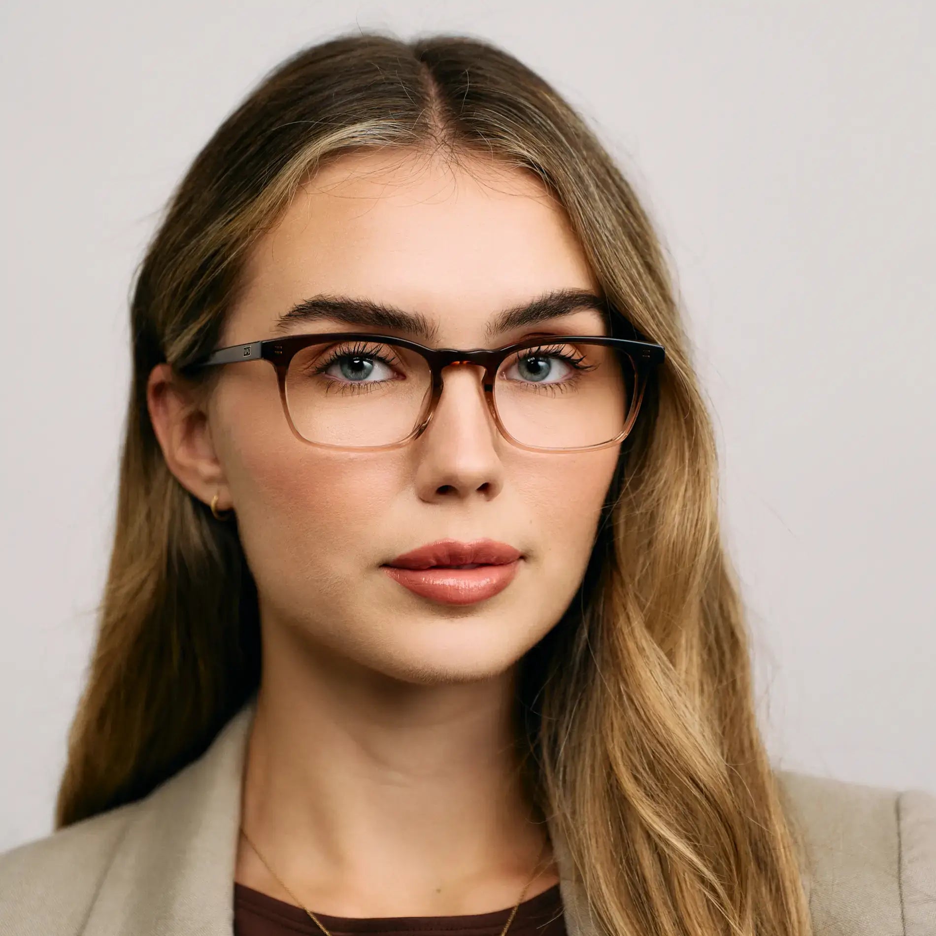 Acacia Brown || Model wearing Women's Rectangular Prescription Glasses with a Acacia Brown Dual-Tone Acetate Frame and Clear Lens