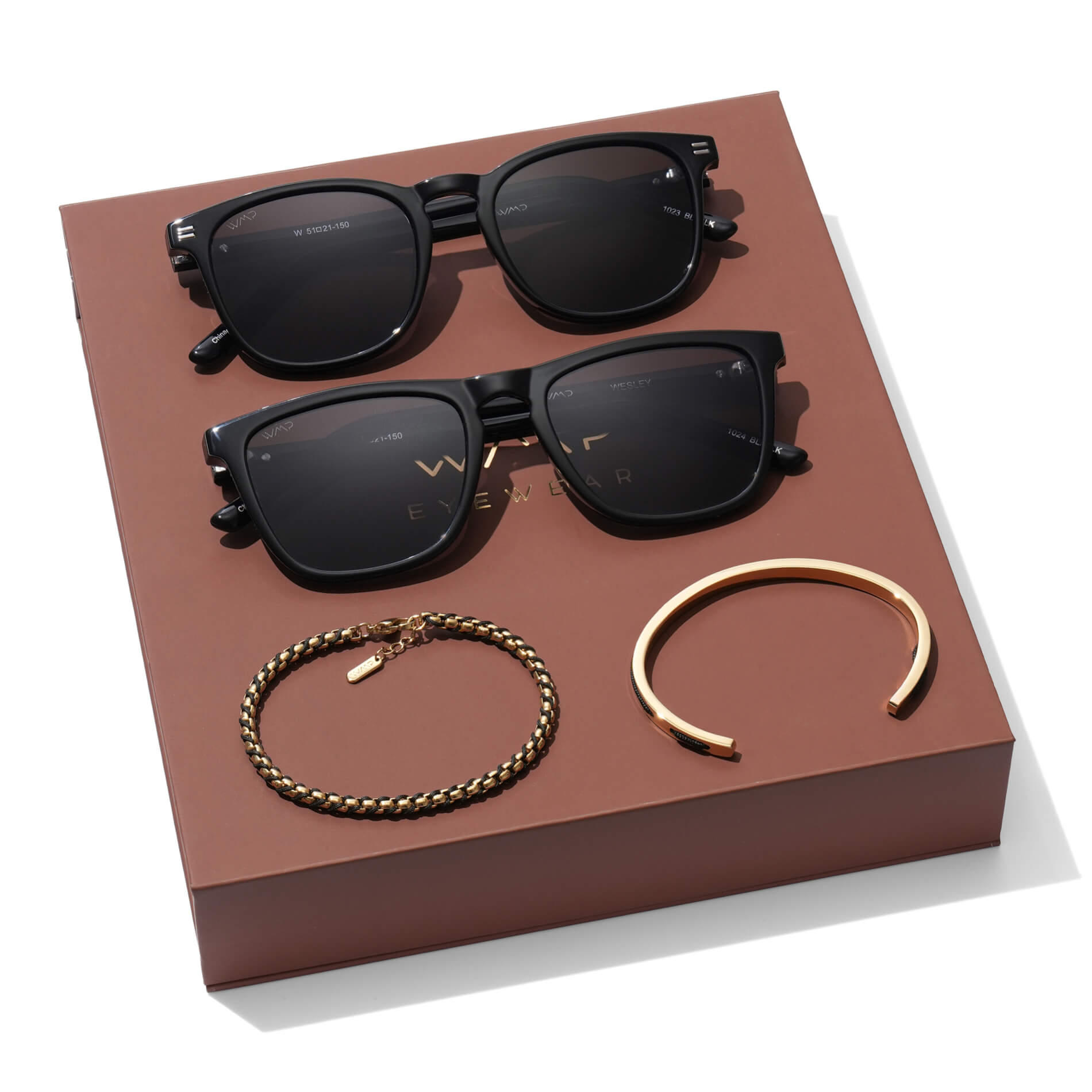 The Obsidian Kit || Men's Gift Kit including Two Pairs of Black Acetate Frame Polarized Black Lens Sunglasses, a stainless steel cuff bracelet, and a stainless steel and polyester rope braided bracelet in gold and black